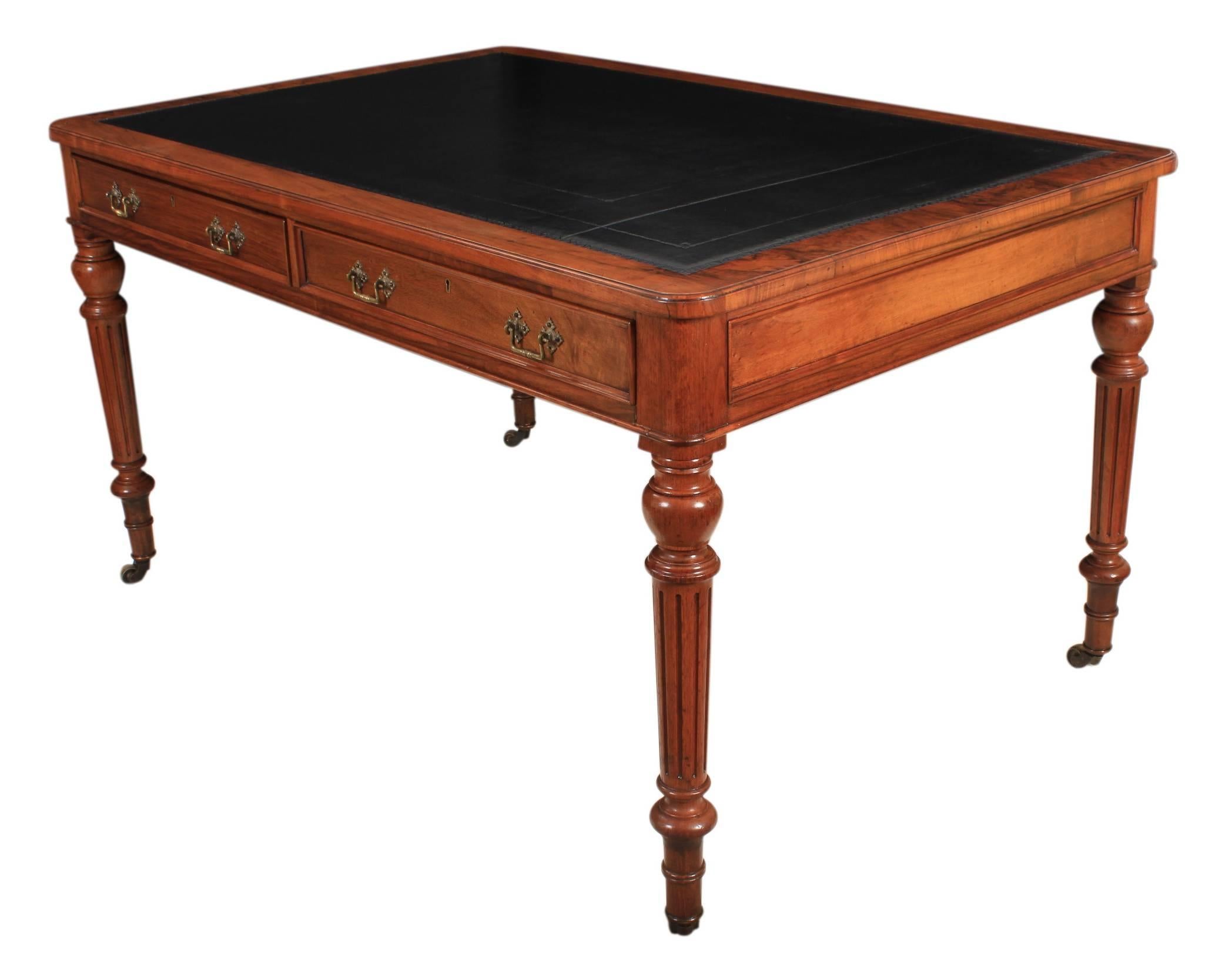 English, circa 1880.
A beautiful writing table, with a burr walnut cross-banded top and new black leather inset writing surface.
In lovely condition, is freestanding meaning it is finished all round and look great at every angle. The table has 2