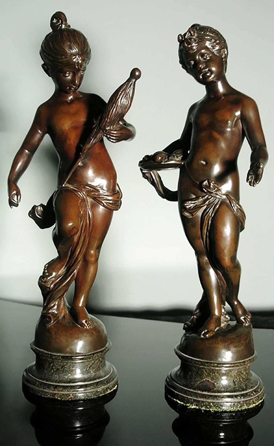 A very good pair of 19th century bronze figures of young girls, one offering fruit from a basket and the other is hand spinning flax. Both on original marble socles, the base of one figure signed A. Mayer. 

When removed from socles, the bronzes