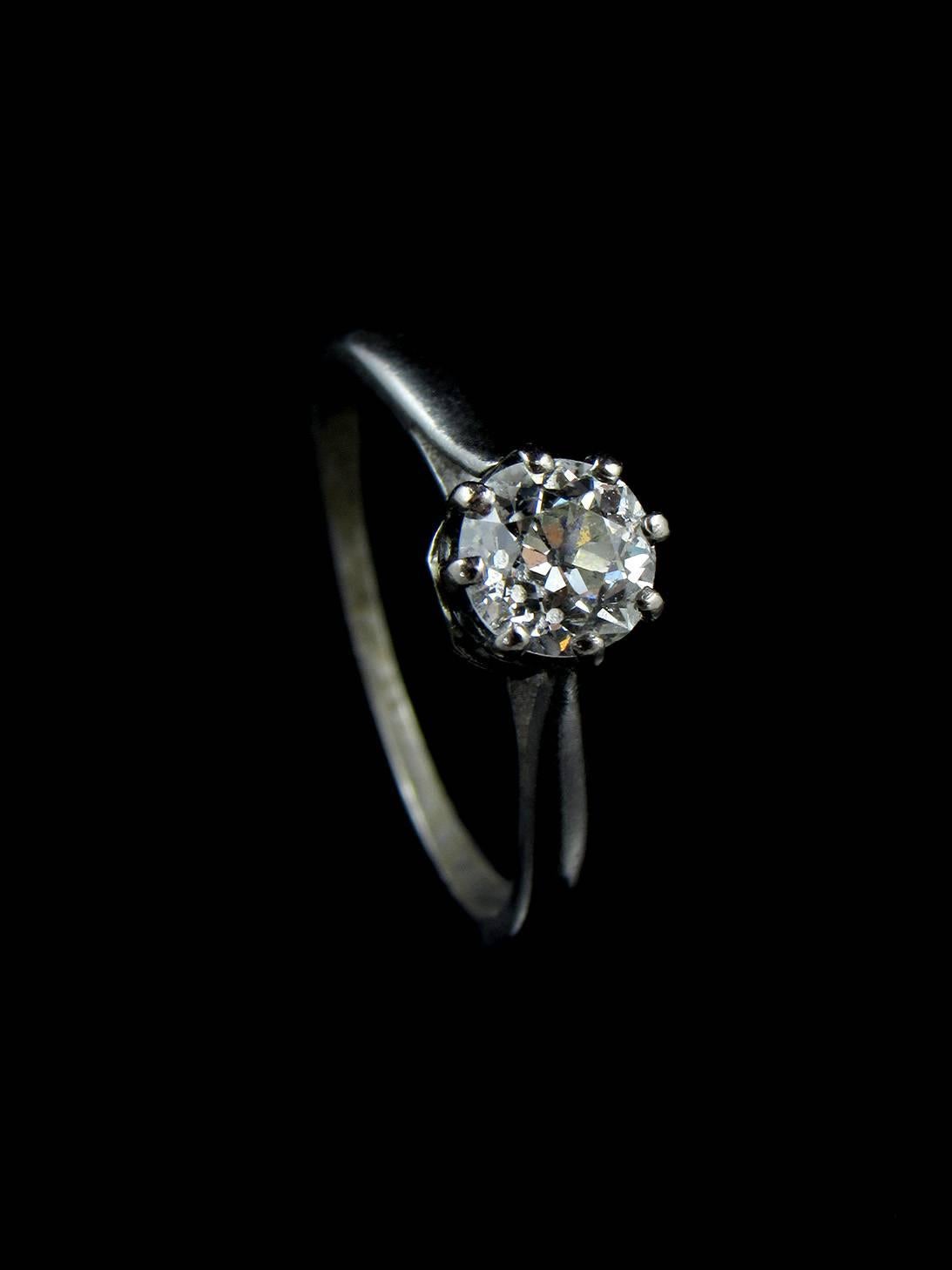 A very delicate diamond ring with a single round cut eight claw set diamond on a solid platinum smooth knife edge shank.

The single stone is the original and weighs approximately 0.5cts. The ring weight is 2.38 grammes.

Recent valuation