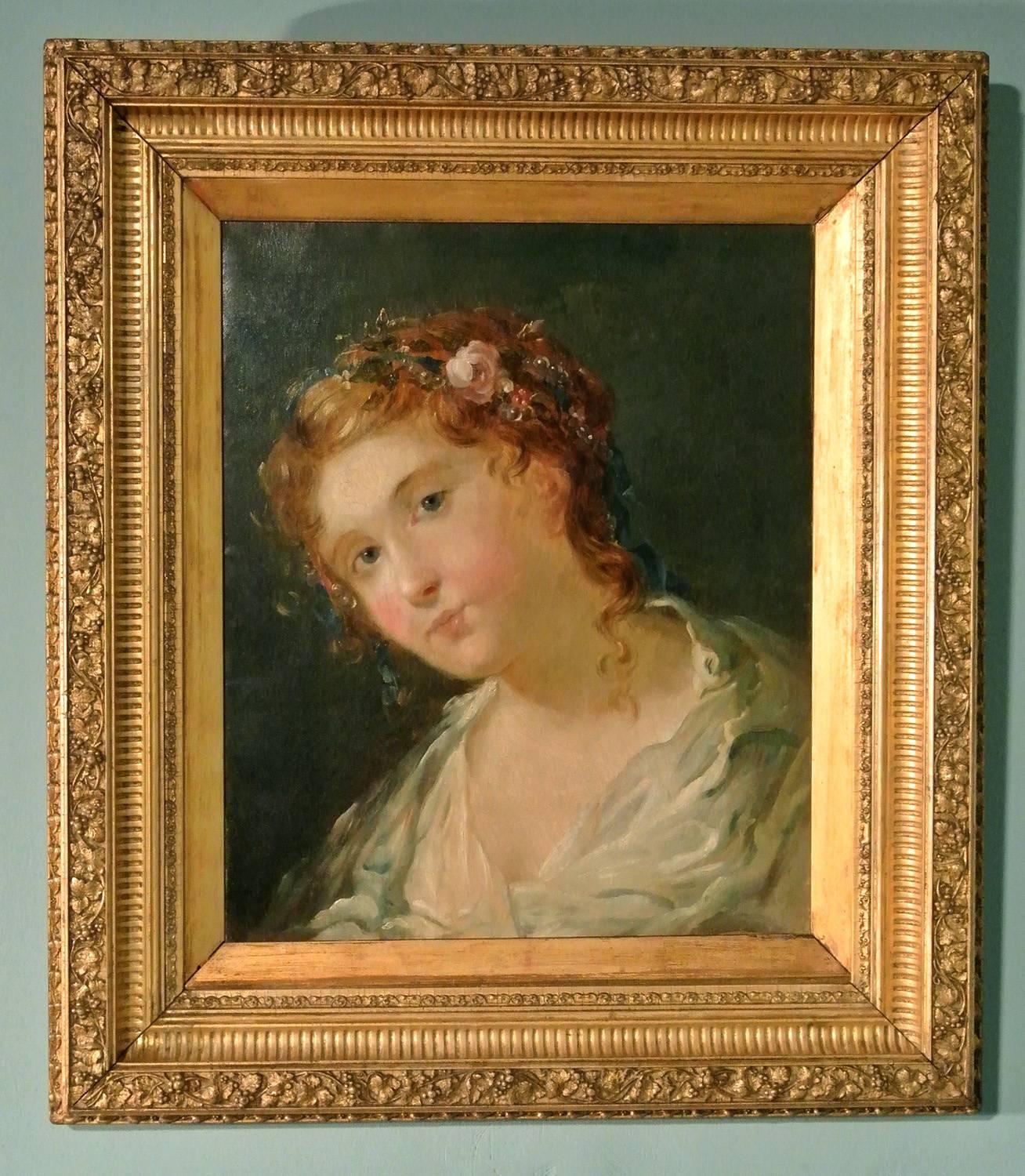 An unusually expressive and well painted oil on canvas of a beautiful and enigmatic young woman or forest nymph draped in pale blue and white silk and with a wild rose and mistletoe garland in her hair.

Beautifully executed, she is caught in a