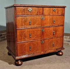 Queen Anne Inlaid Walnut and Oak Chest of Drawers, circa 1700