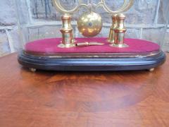 Antique Skeleton Clock under Glass Dome
