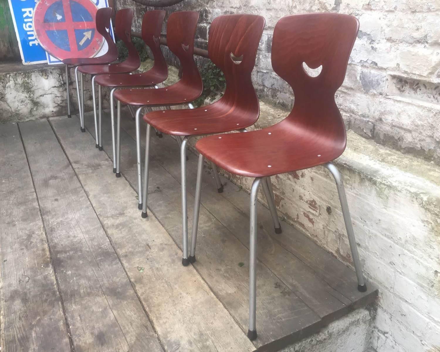 Set of six waisted shape Pagwood chairs designed by Galvanitas - Dutch Industrial design at its best.
 
Designed in the late 1950s-early 1960s, and produced by Galvanitas in Netherlands, this set is made of Pagwood, plywood veneers soaked in resin