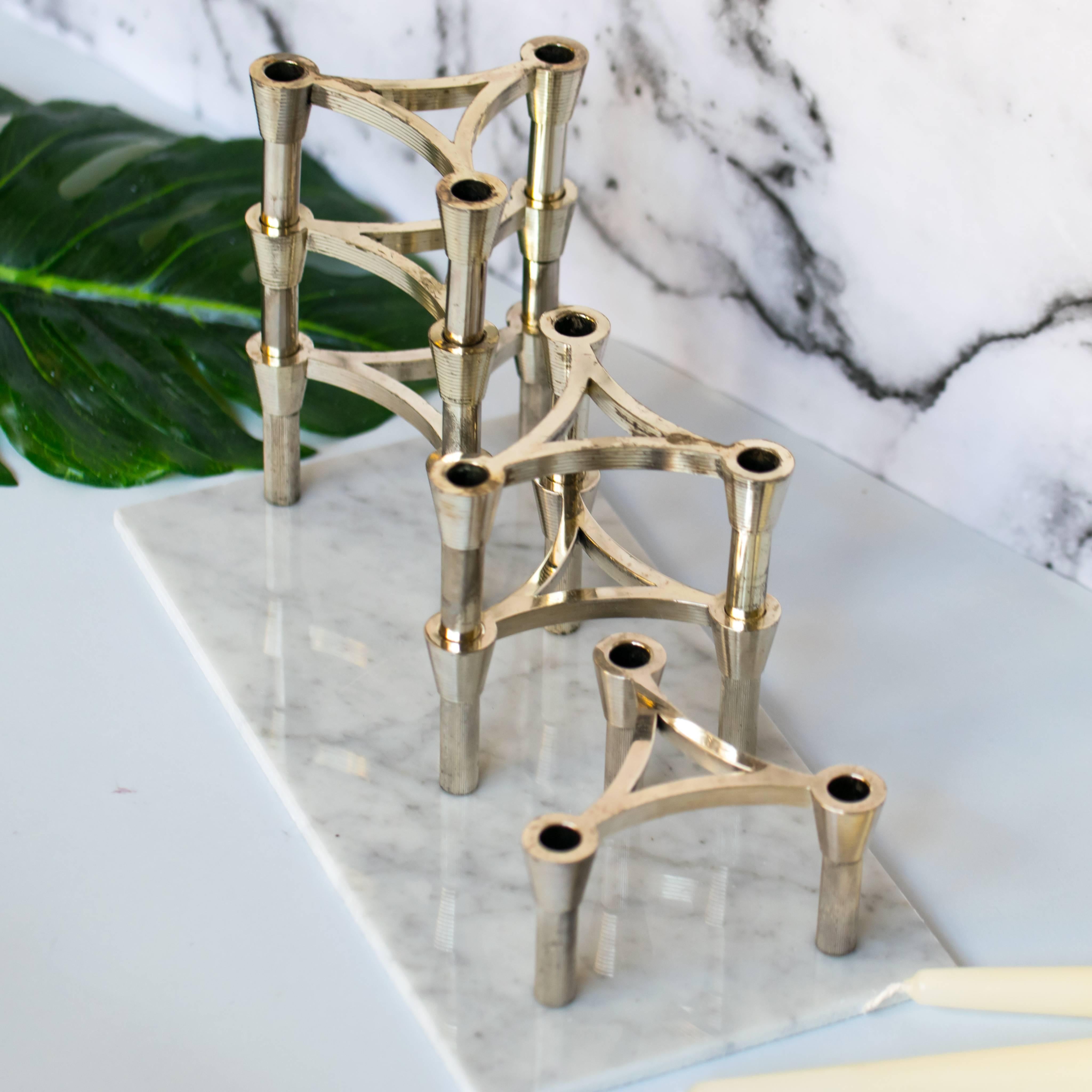 A striking set of Mid-Century Nagel and Stoffi Brutalist modular candle holders. The set consists of six units that can hold up to 18 candles.

The nickel, chrome-plated set of six pieces is modular and stackable so you can create your own shapes