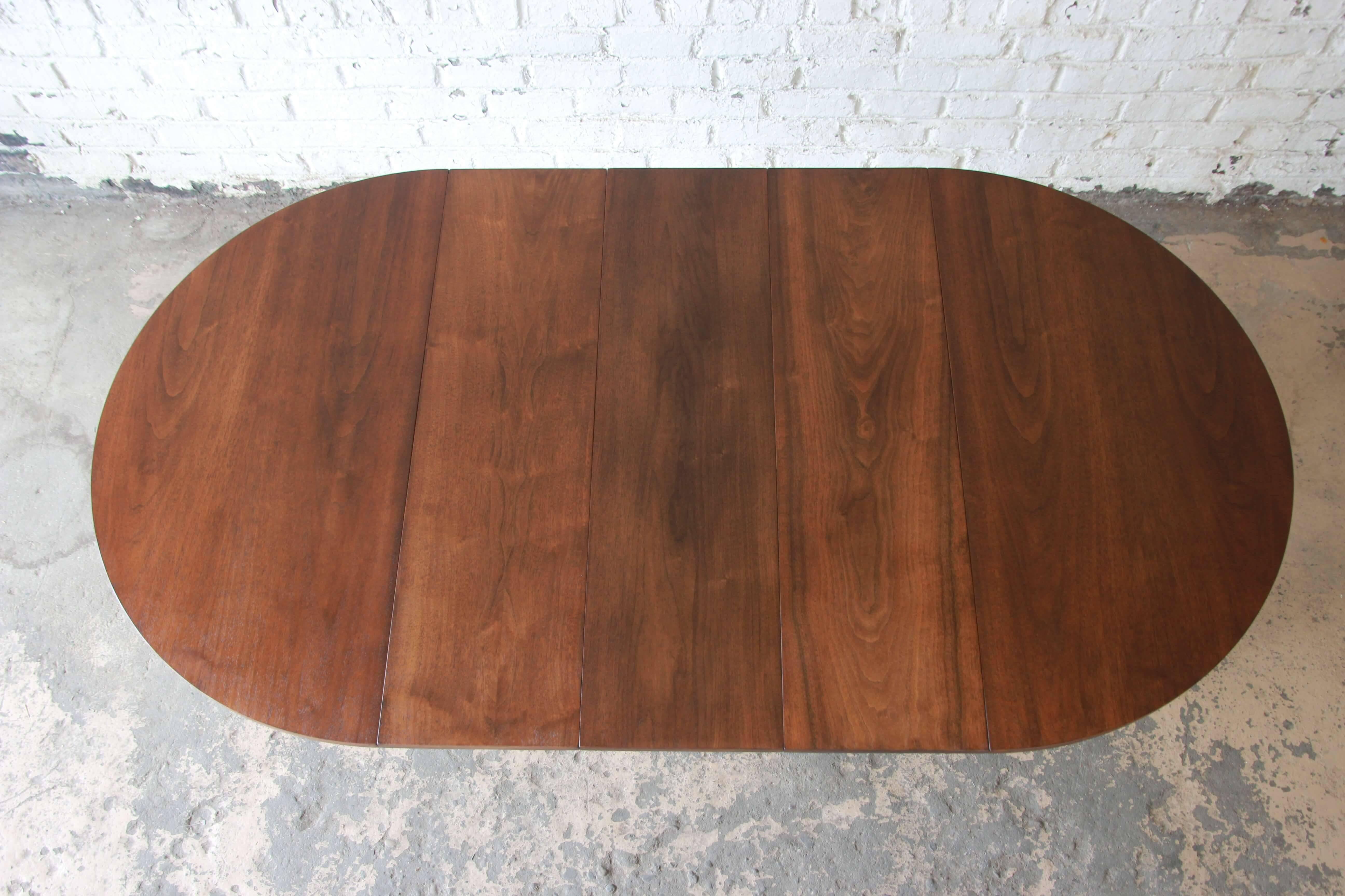 North American Broyhill Brasilia Sculpted Walnut Extension Dining Table