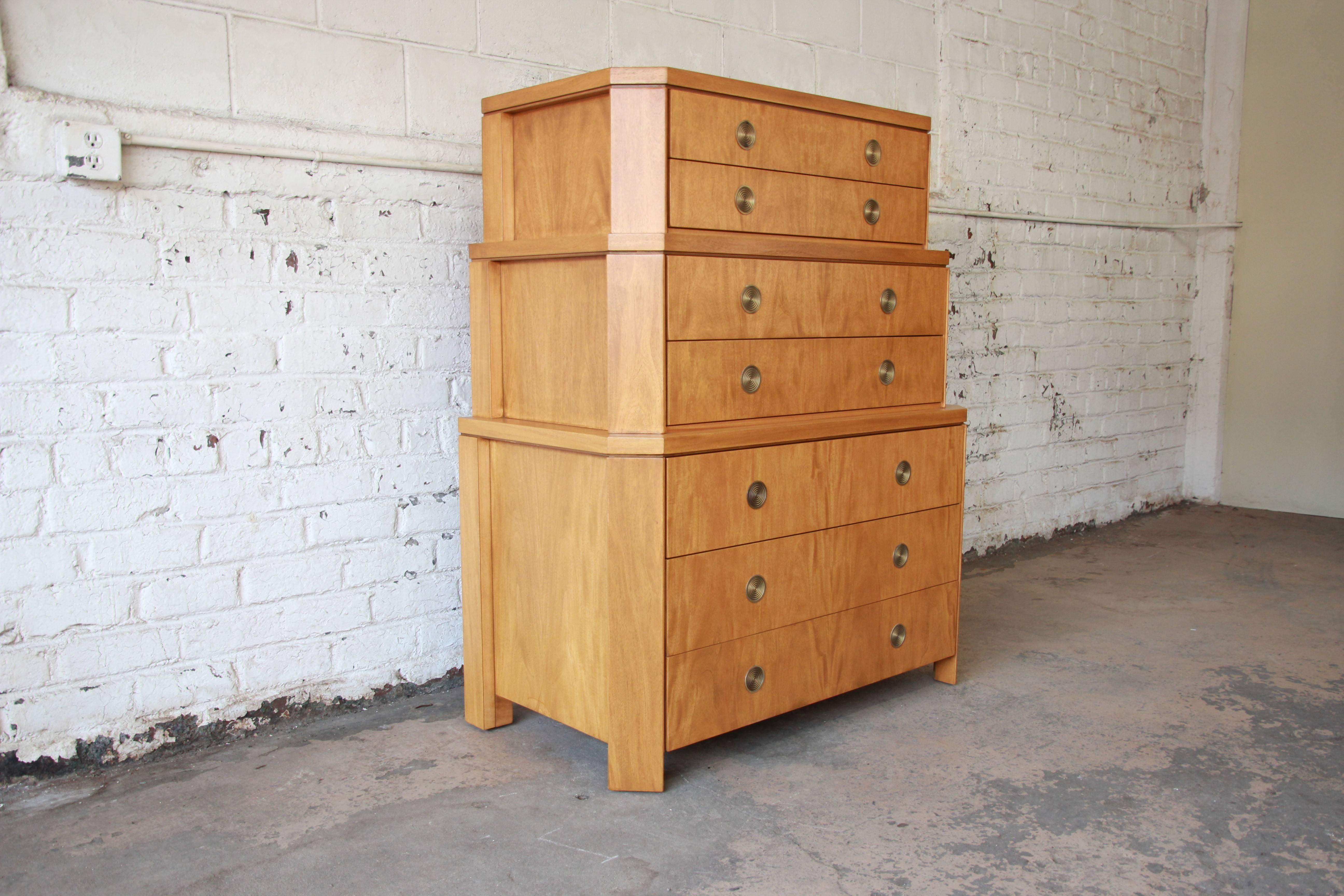 A rare and exceptional triple chest-on-chest highboy dresser by Baker Furniture. From the only collection of residential furniture by renowned San Francisco designer Charles Pfister (1940-1990), this three section chest with canted corners was