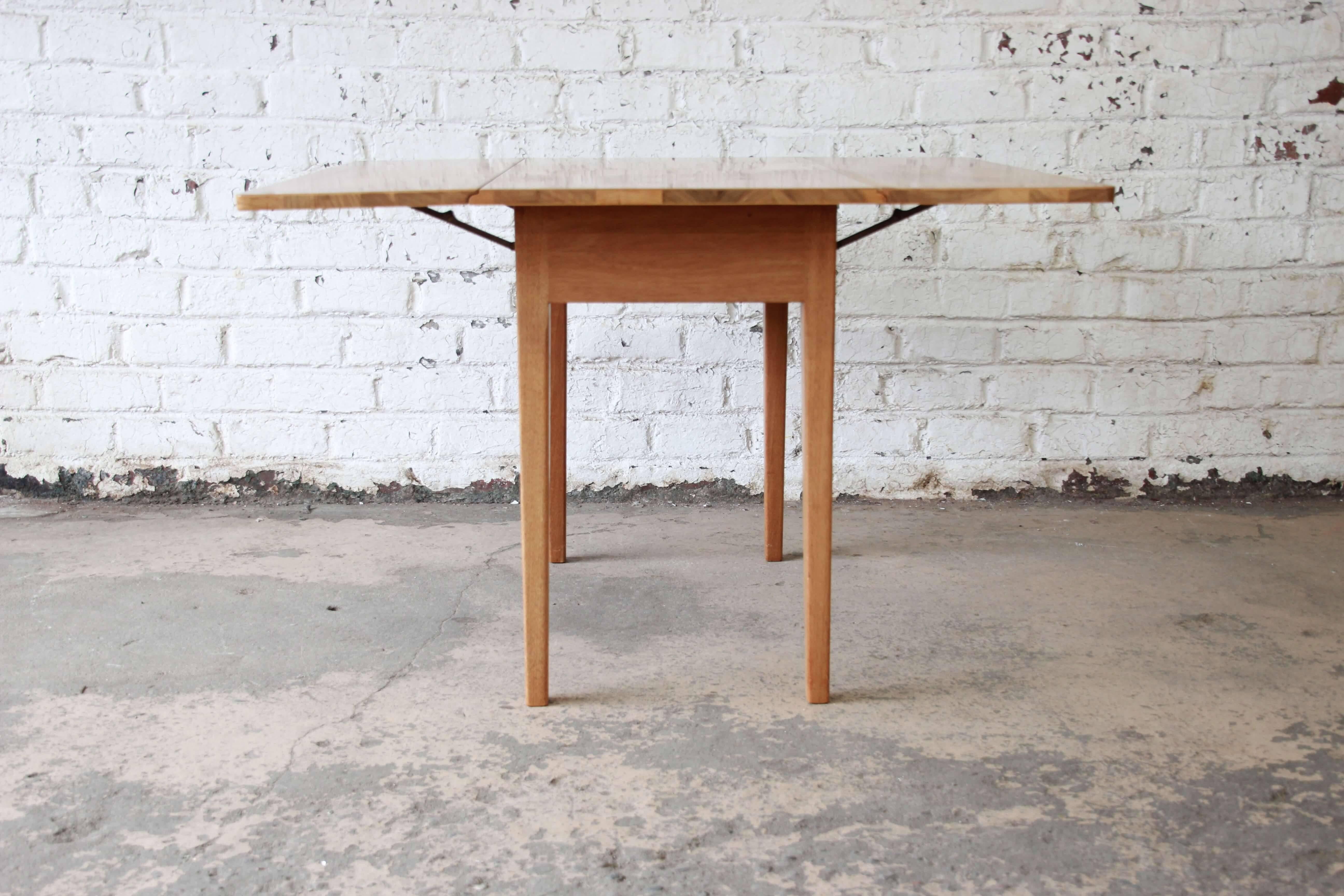 Mid-20th Century Early Edward Wormley for Dunbar Mahogany Drop-Leaf Dining Table