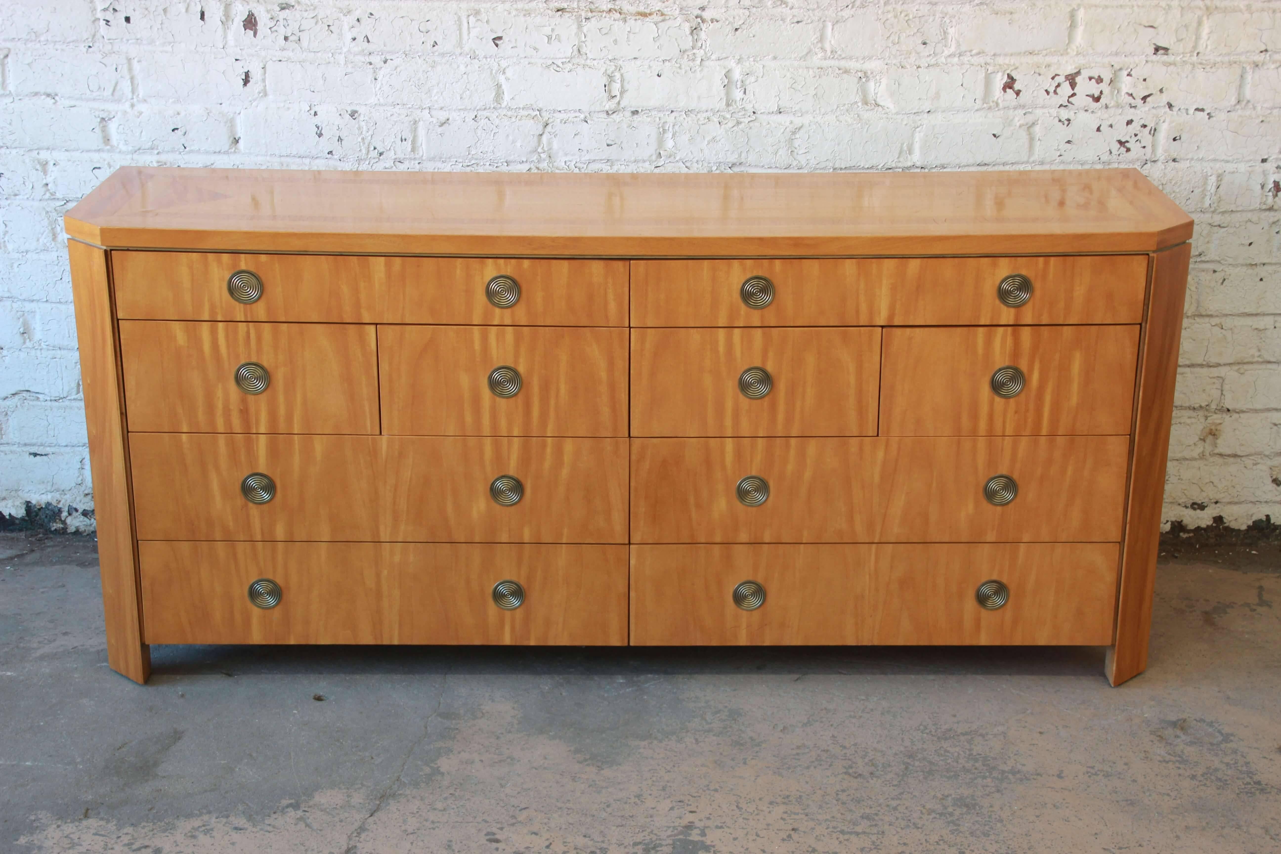 A rare and exceptional ten-drawer dresser by Baker Furniture. From the only collection of residential furniture by renowned San Francisco designer Charles Pfister (1940-1990), this ten drawer dresser with canted corners was offered through Baker for