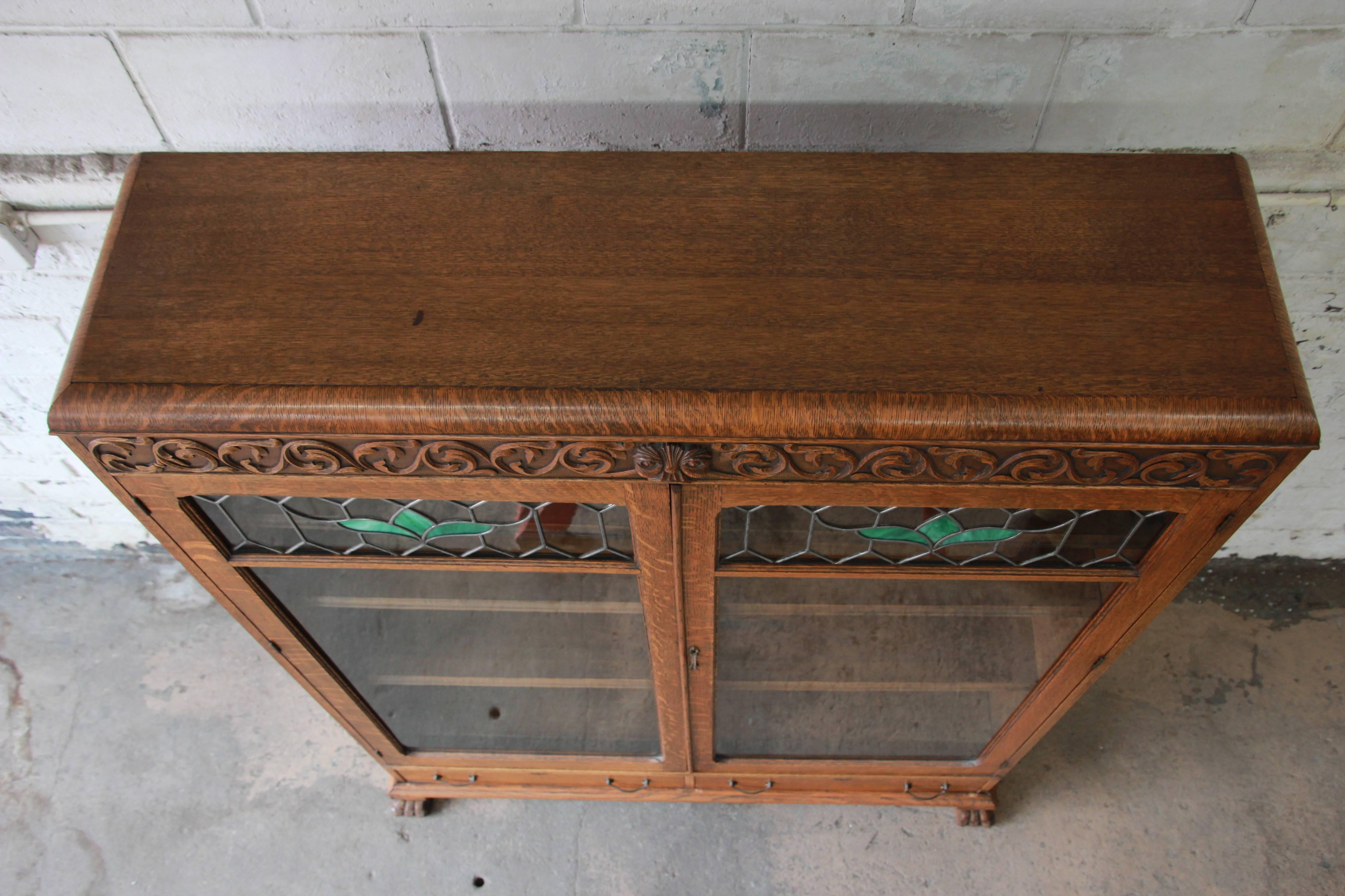 Early 20th Century Antique Carved Oak Bookcase with Leaded Stained Glass Doors, circa 1900