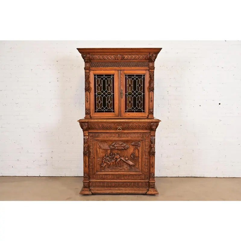 Antique French Renaissance Revival Carved Oak Breakfront Bookcase, Circa 1890s For Sale