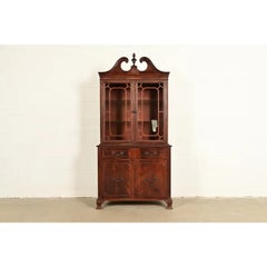 Baker Furniture Style Georgian Carved Flame Mahogany Lighted Breakfront Bookcase