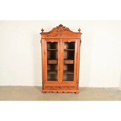 R. J. Horner Style Antique Victorian Carved Walnut Bookcase Cabinet, Circa 1880s