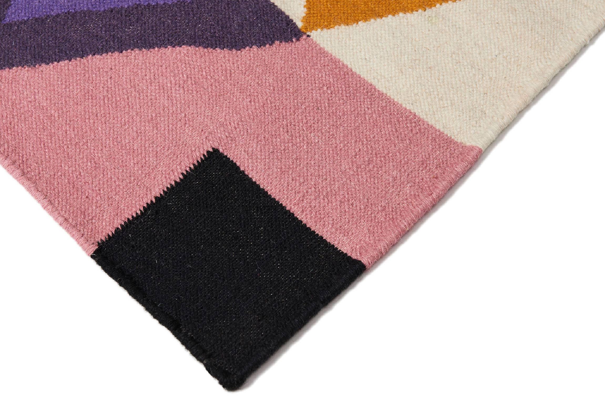 Modern, functional, sustainable. Make a statement with the Heatwave in Rajasthan design. It's is bold, colorful and unique. A Geometric handwoven Dhurrie rug with a modern fresh approach. Designed by AELFIE.
