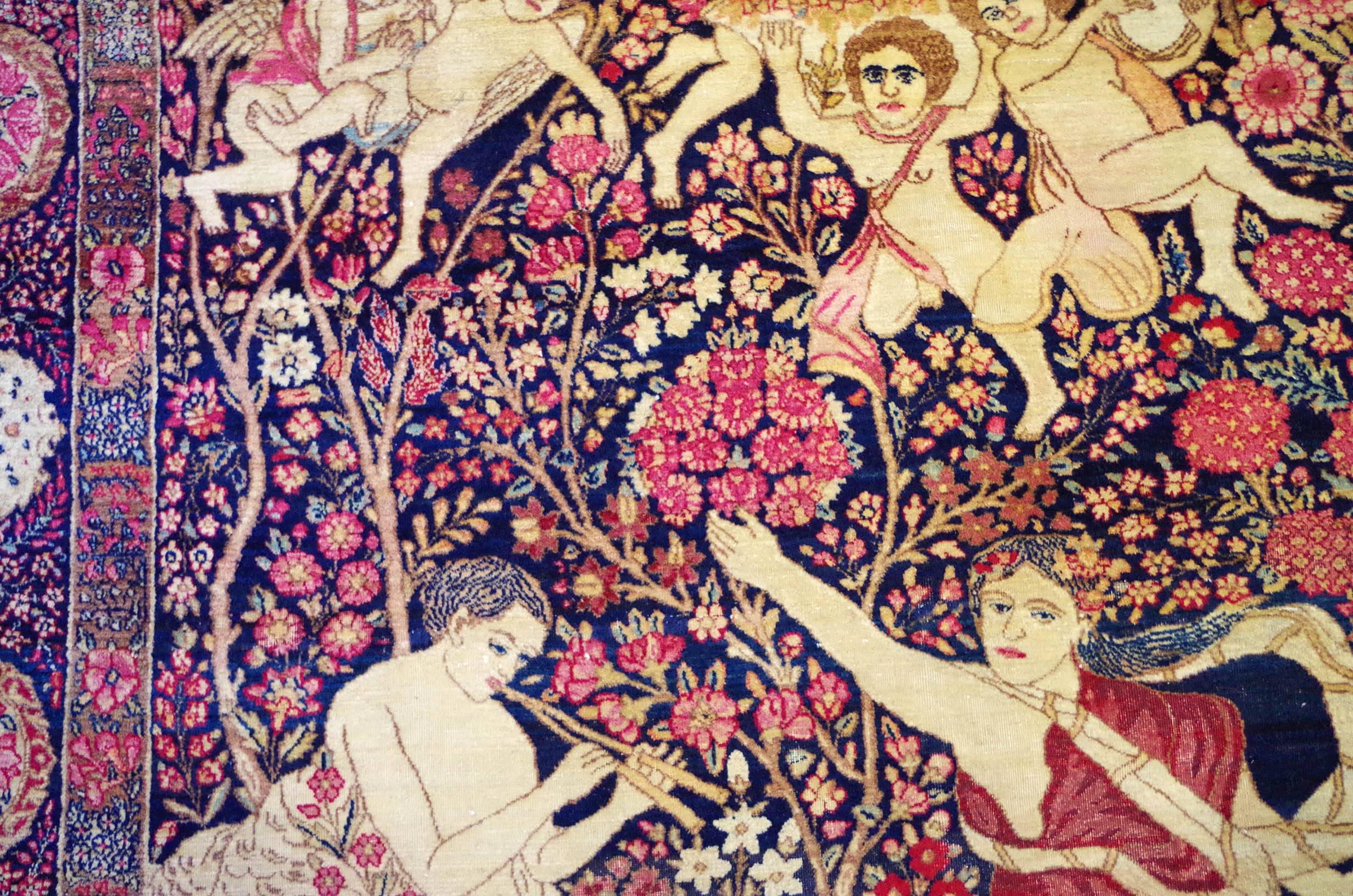 The design of this rug was based on a tapestry depicting the 'Dance of the Nymph' from the series Subjects of the Roman Fables, after Raphael. Nasir al'Din Shah had a copy of this tapestry hanging in the Golestan Palace, presumably providing the