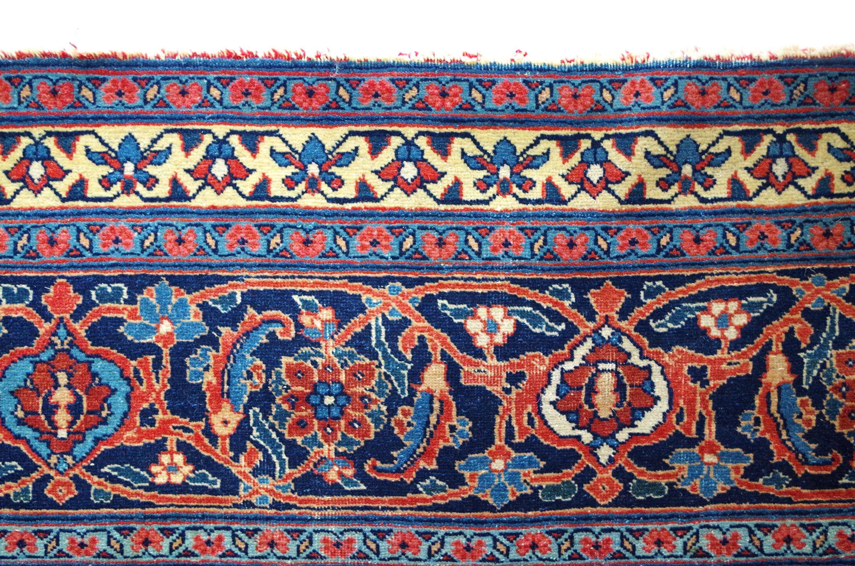 All-over Herati design on a red field. North-West Persia, circa 1910. Cotton warp and weft, woollen pile. Good condition, no repairs.