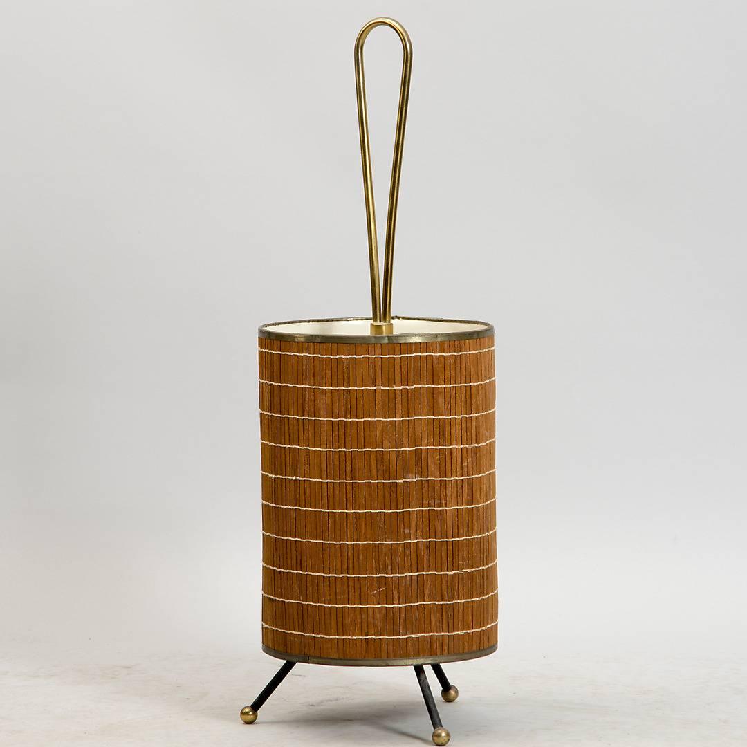 Whimsical umbrella stand. Painted metal, brass, and teak, from the 1950s.
