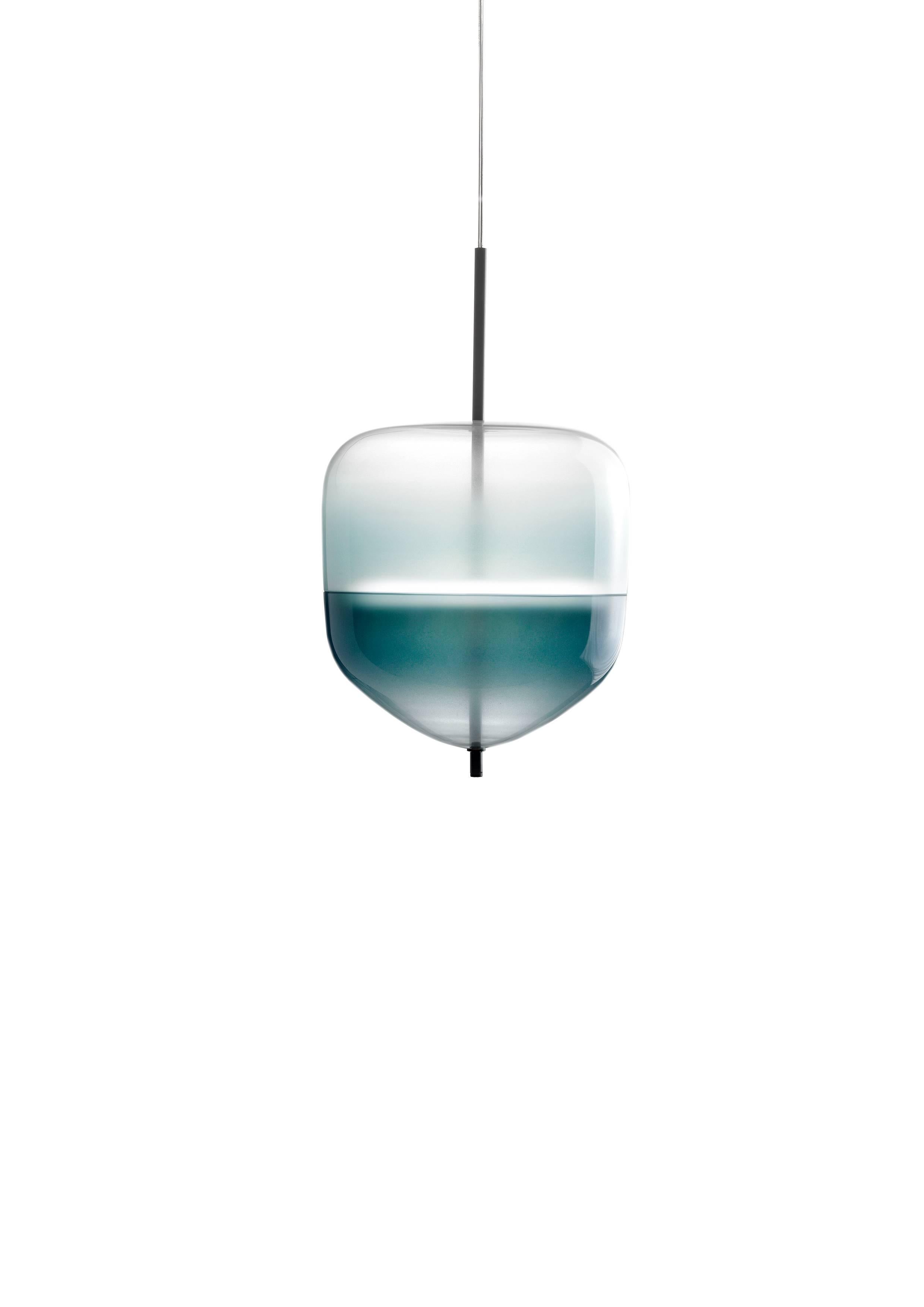 Flow [T] is a contemporary chandelier inspired by the colors of the Venetian lagoon and customized to the desires of each owner. Each piece enjoys its own shape, and in multiples, they create a sculptural display of lighting.

Light source: 30 ×