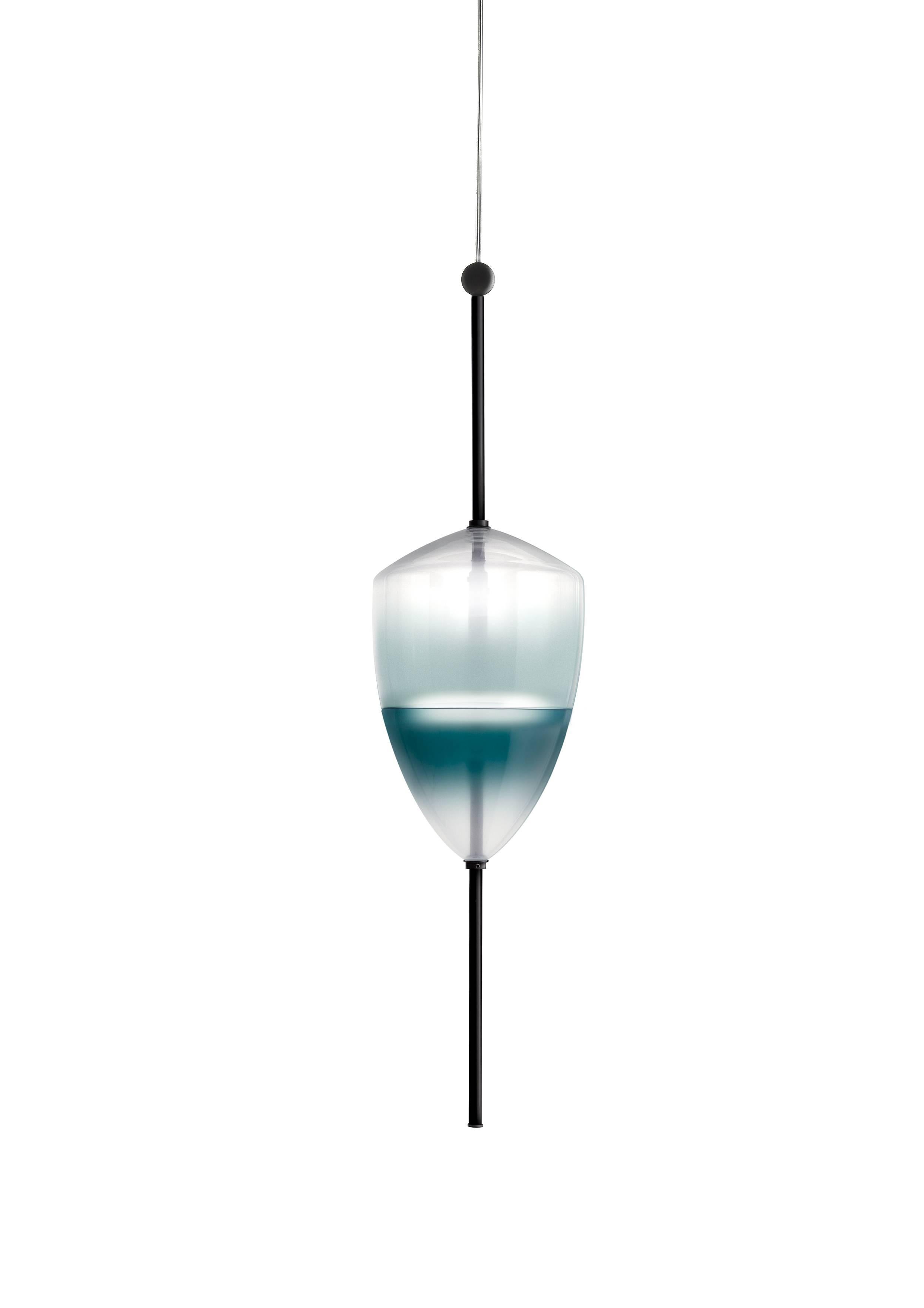 Flow[T] is a contemporary chandelier inspired by the colors of the Venetian lagoon and customized to the desires of each owner. Each piece enjoys its own shape, and in multiples, they create a sculptural display of lighting.

Light source: 18 ×