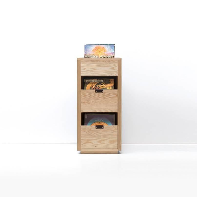 Our Dovetail Vinyl storage cabinets utilize a “file drawer” approach to store LPs and allow you to easily flip through an entire record collection while enjoying a visual display of record cover art across the front of the cabinet. The design