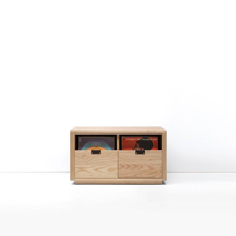 Our Dovetail Vinyl Storage Cabinets utilize a “file drawer” approach to store LPs and allow you to easily flip through an entire record collection while enjoying a visual display of record cover art across the front of the cabinet. The design