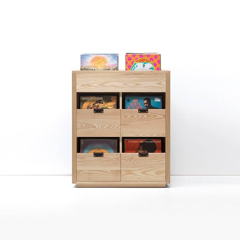 Our dovetail vinyl storage cabinets utilize a “file drawer” approach to store LPs and allow you to easily flip through an entire record collection while enjoying a visual display of record cover art across the front of the cabinet. The design