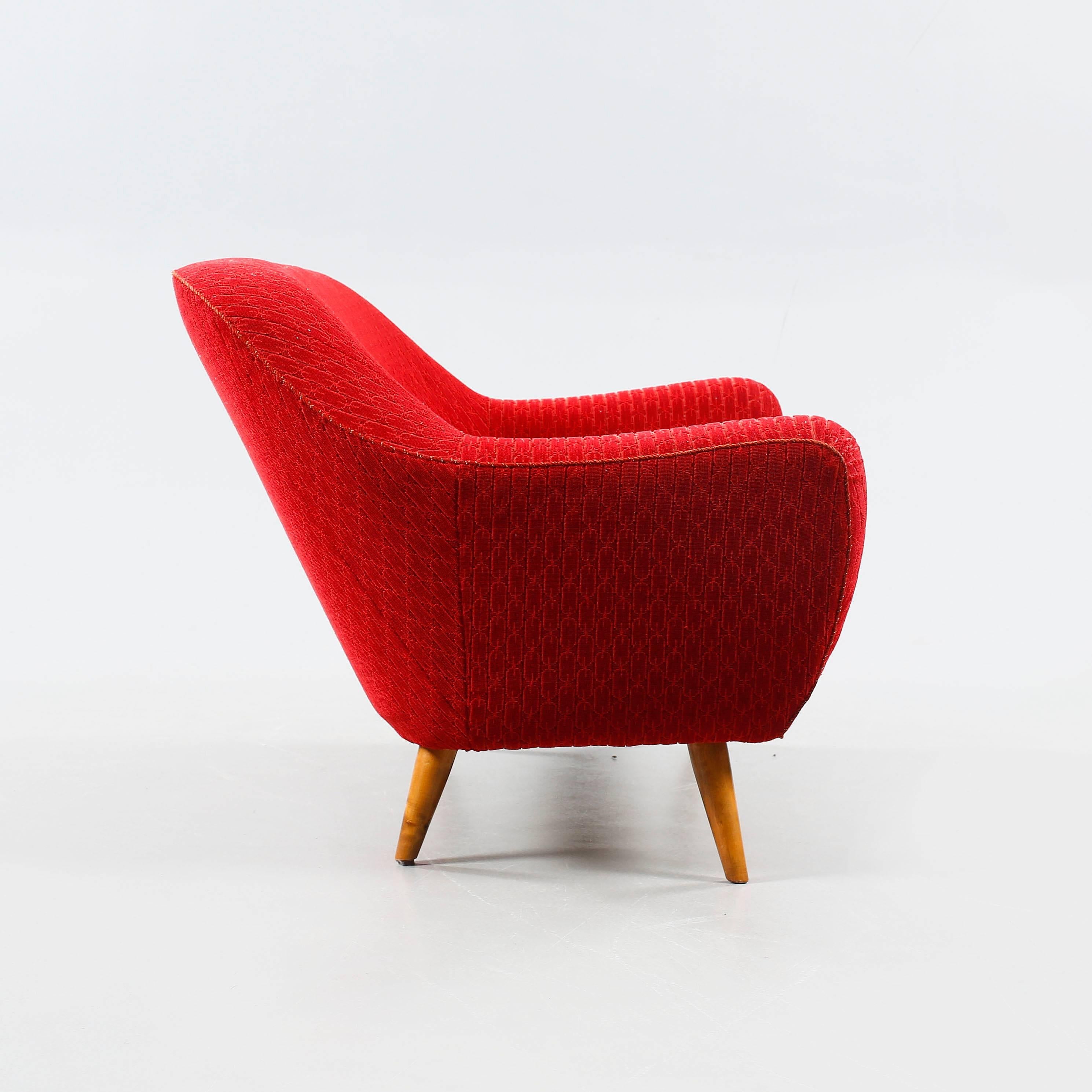 Sofa model 'Chile' designed by Svante Skogh for AB Klings Möbler, in Sweden 1953. Seat wool upholstery. Polished wooden legs.

 