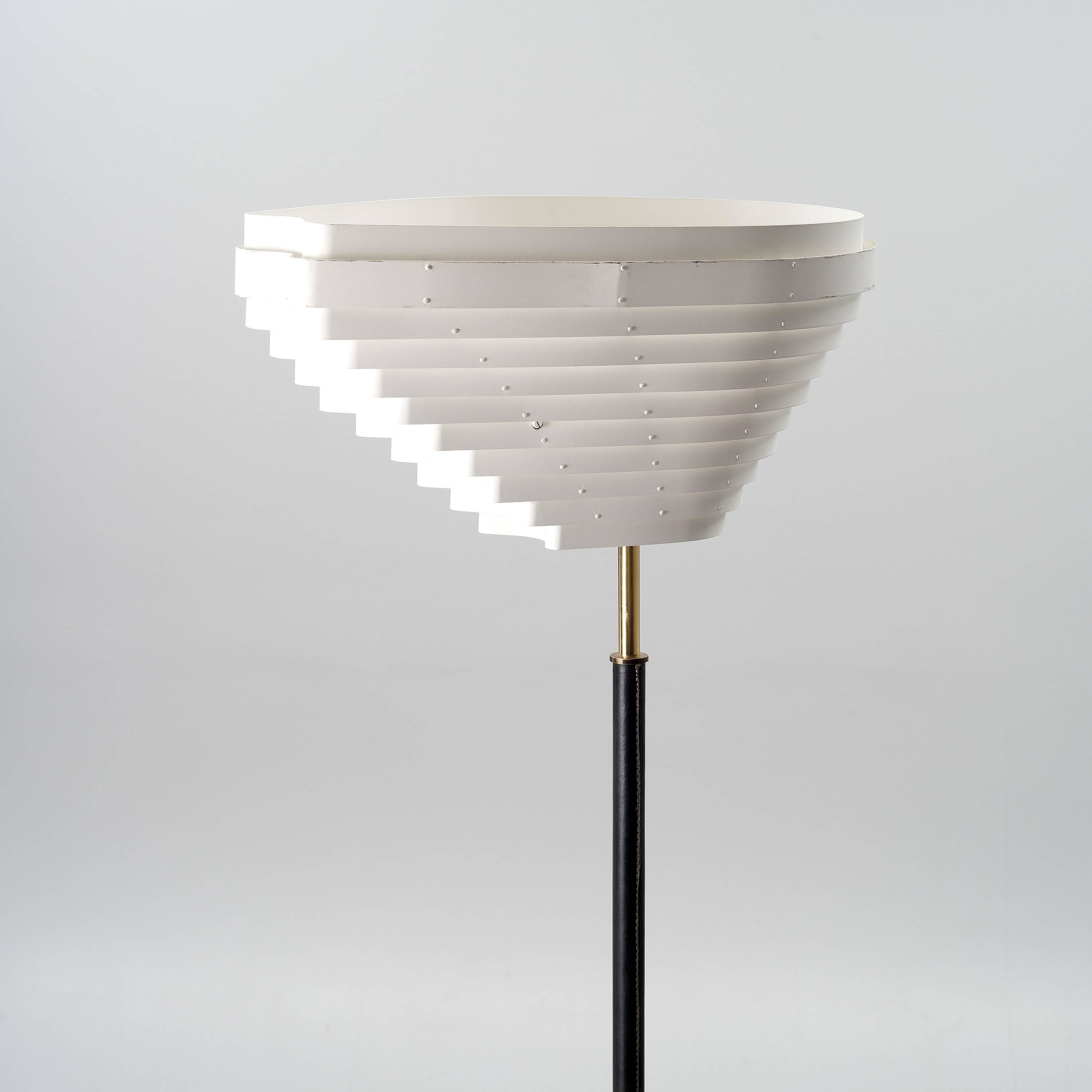Floor lamp model A805 'Angel Wing', in metal, leather and brass, by Alvar Aalto for Valaistustyö, Finland, 1954.