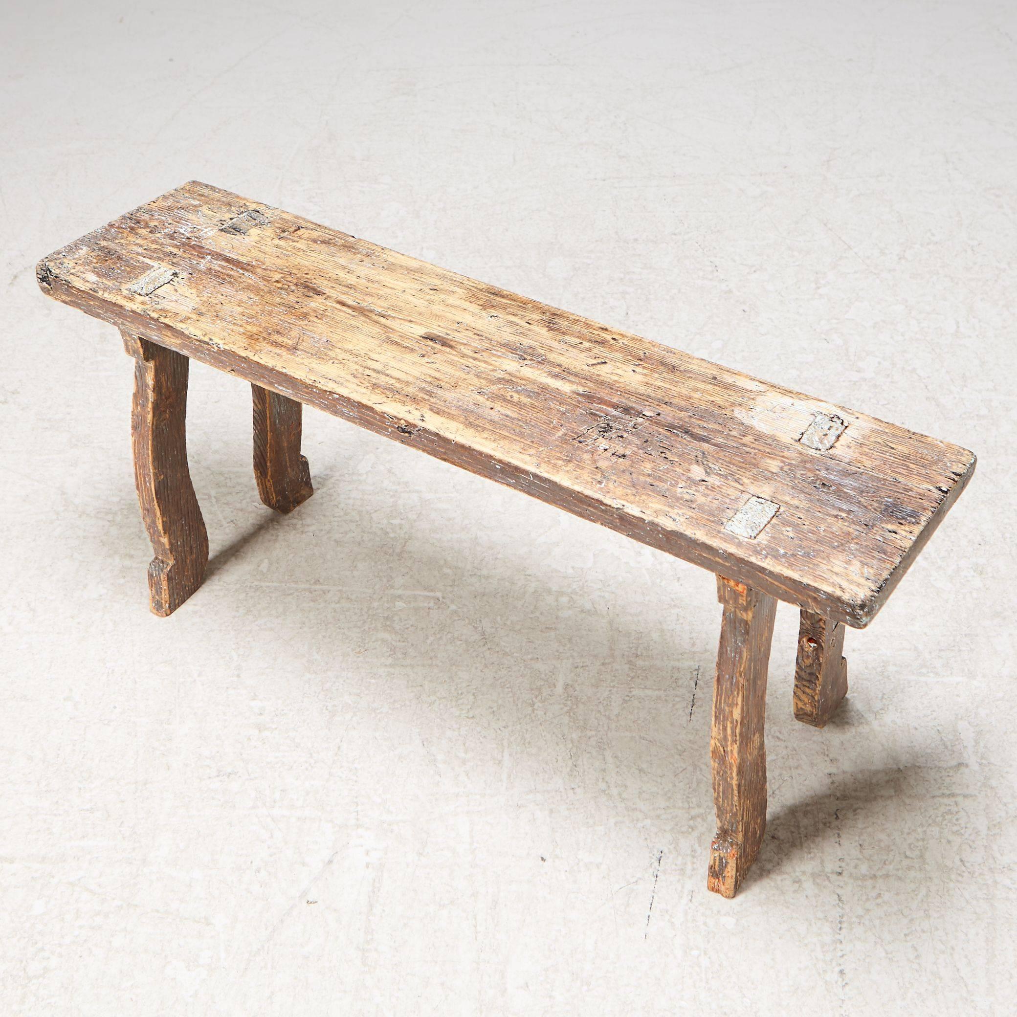 Early 19th century Swedish Folk Art bench with old patina.
Signed and dated in 1816 under the seats.