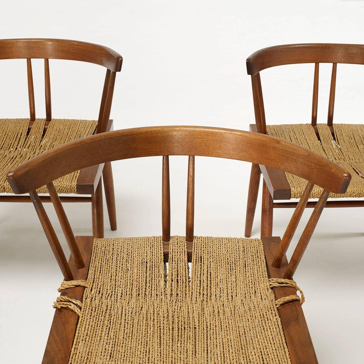 George Nakashima woven grass rope seat chairs with walnut frames. New Hope, PA, 1957/67.
Good vintage condition.