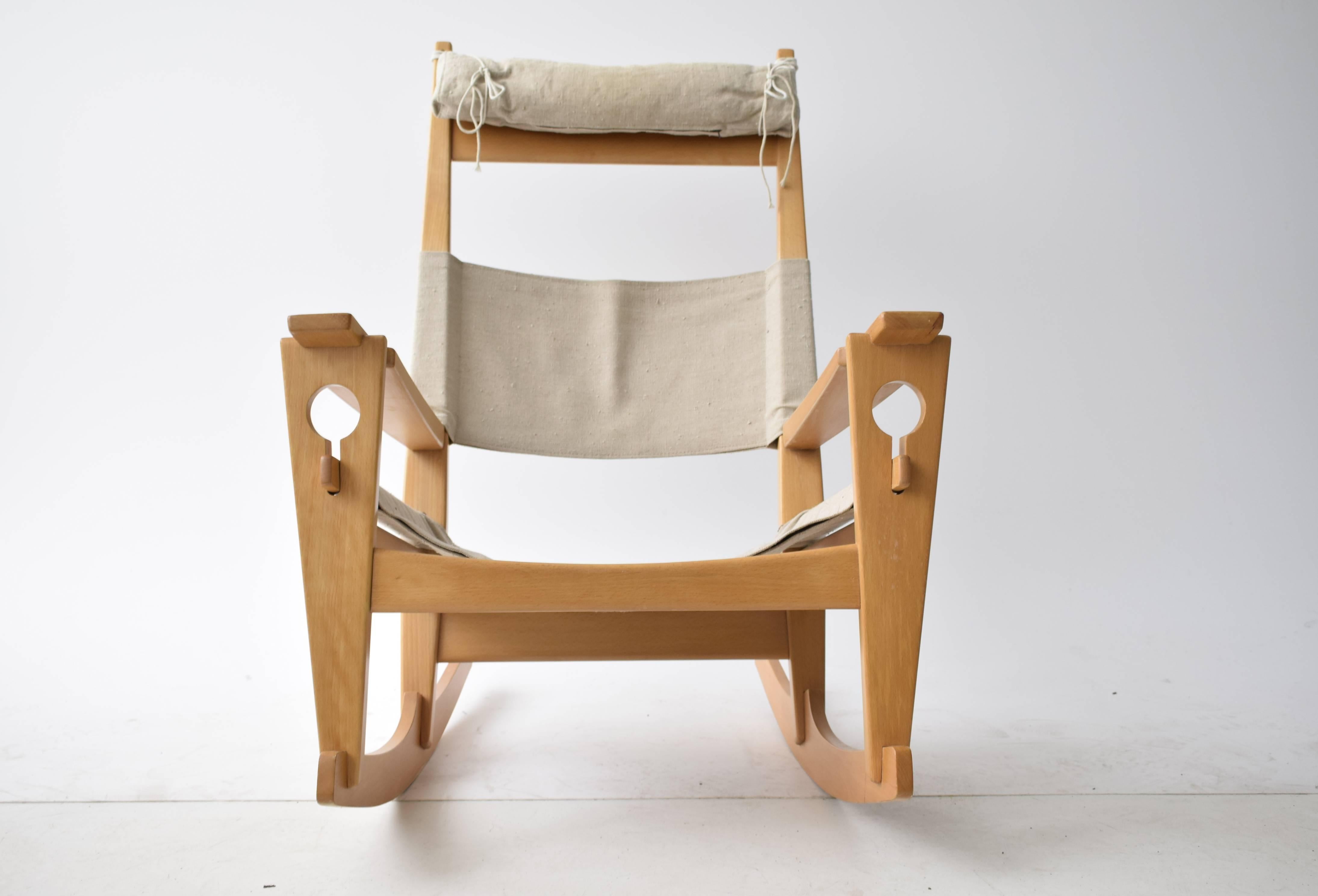 Keyhole rocking chair designed by Hans J. Wegner for GETAMA in Denmark in 1960s. Frame made in natural beechwood and linen.