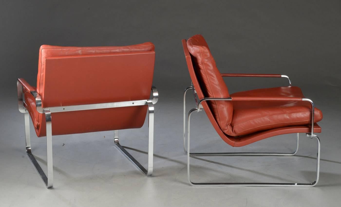 Pair of Danish easy chairs by Jørgen Lund & Ole Larsen, made in steel chromed and upholstered in leather. Produced by Bo-Ex in Denmark in 1960 in short production.