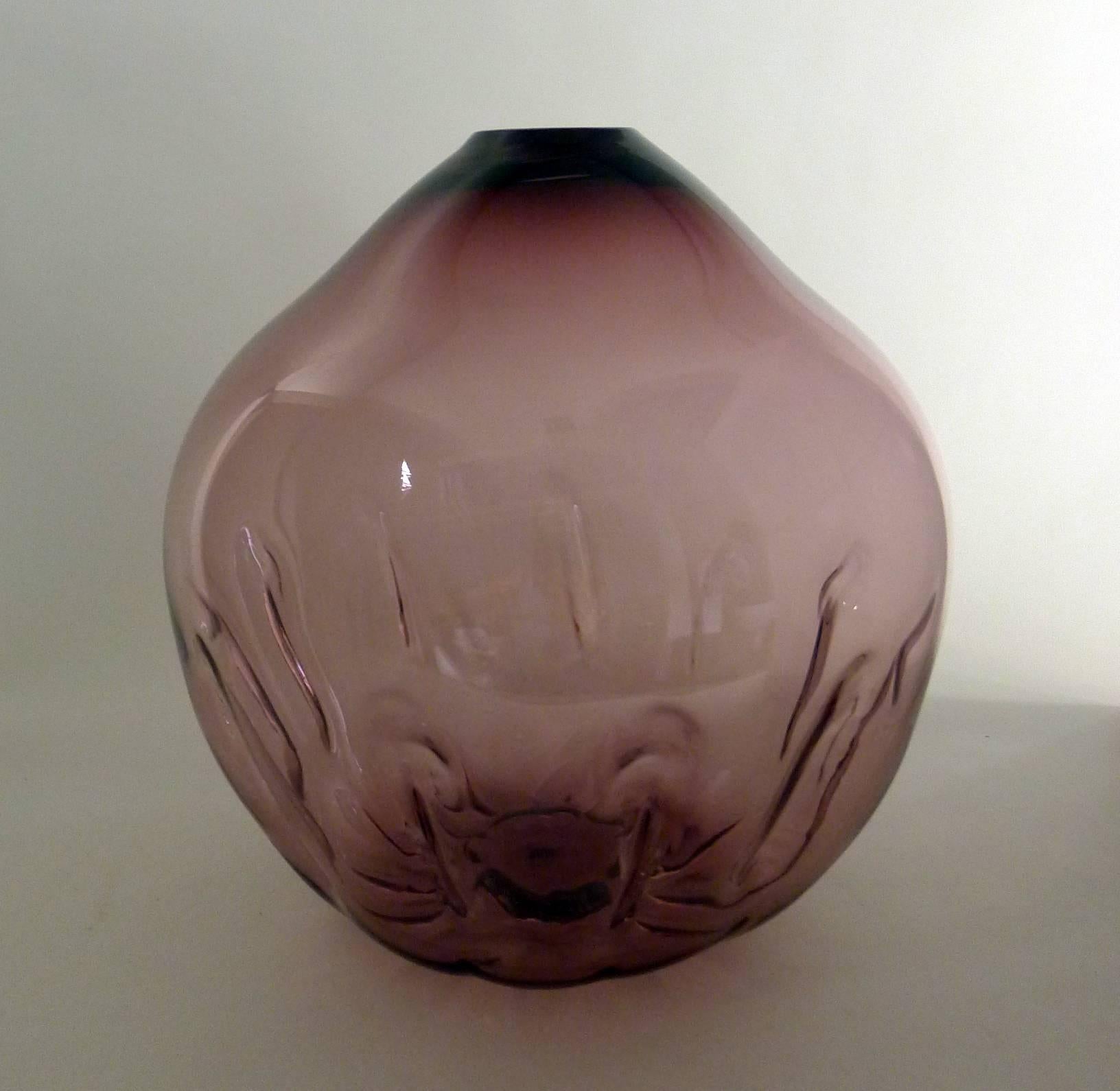 A unique purple soliflor vase designed by Swiss architect Christian Geissbuhler
Blown by Cenedese Albarelli Vetreria in Murano Venezia
Signed underneath.
  