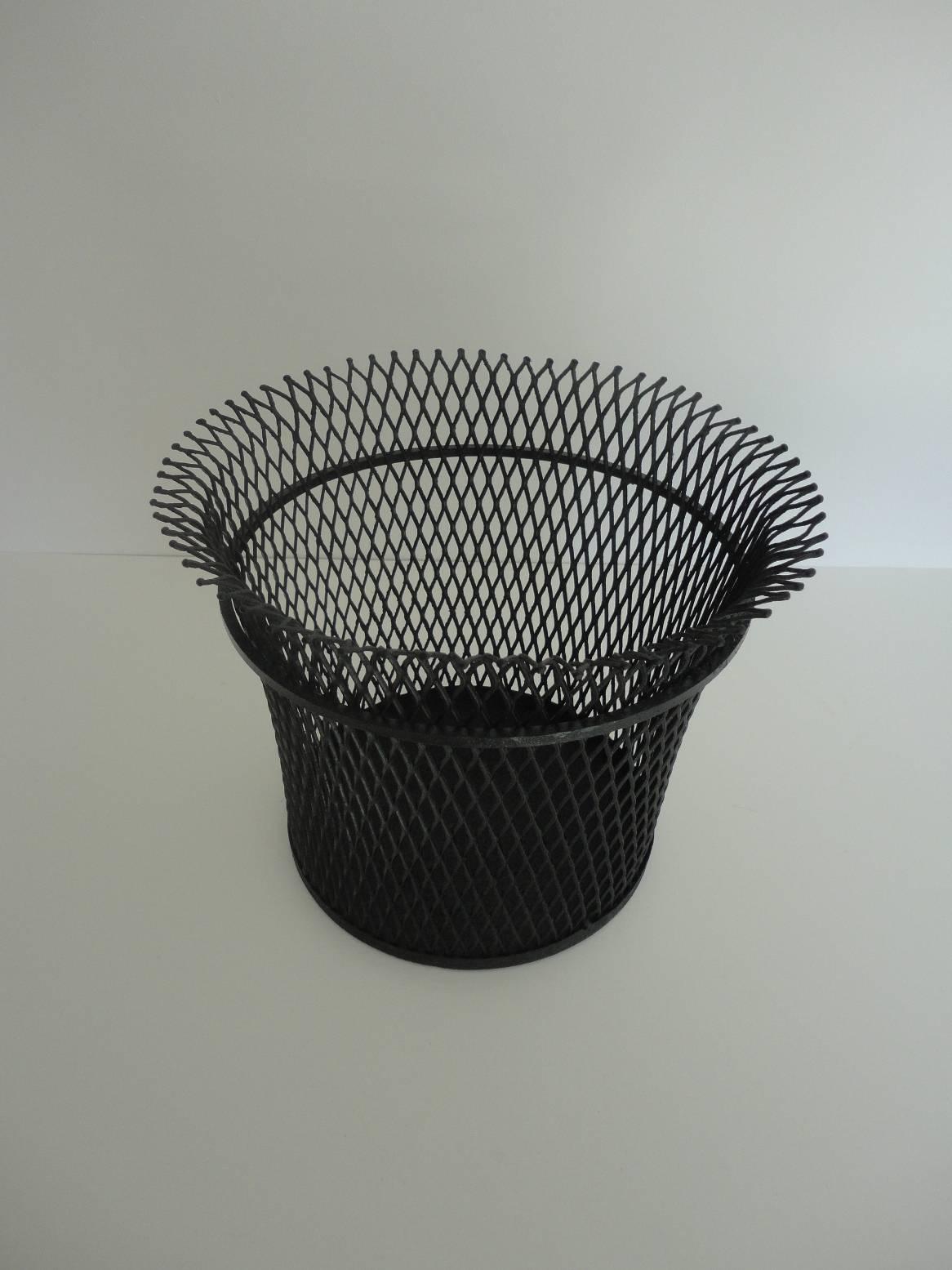 Wastepaper basket designed in 1951 by Mathieu Mategot. Black lacquered metal. Documented in the book 