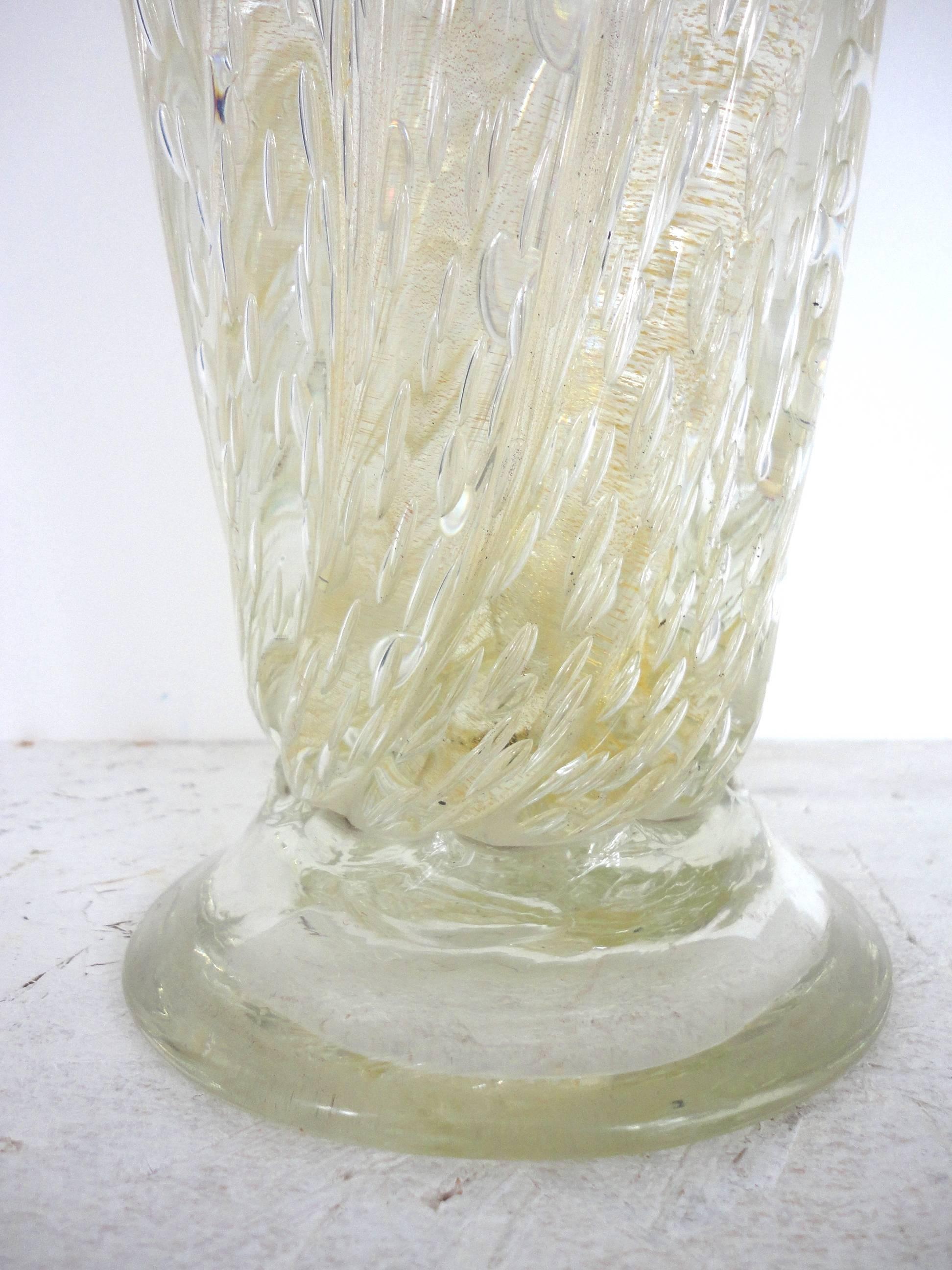 Large handblown vase was made by Barovier & Toso in Murano, 1950s.
Glass with coordinated air bubbles and gold flecks (cordonato d'oro) throughout the vase giving it a citrine aspect.
The vase is in excellent condition.
Weight 6kg.