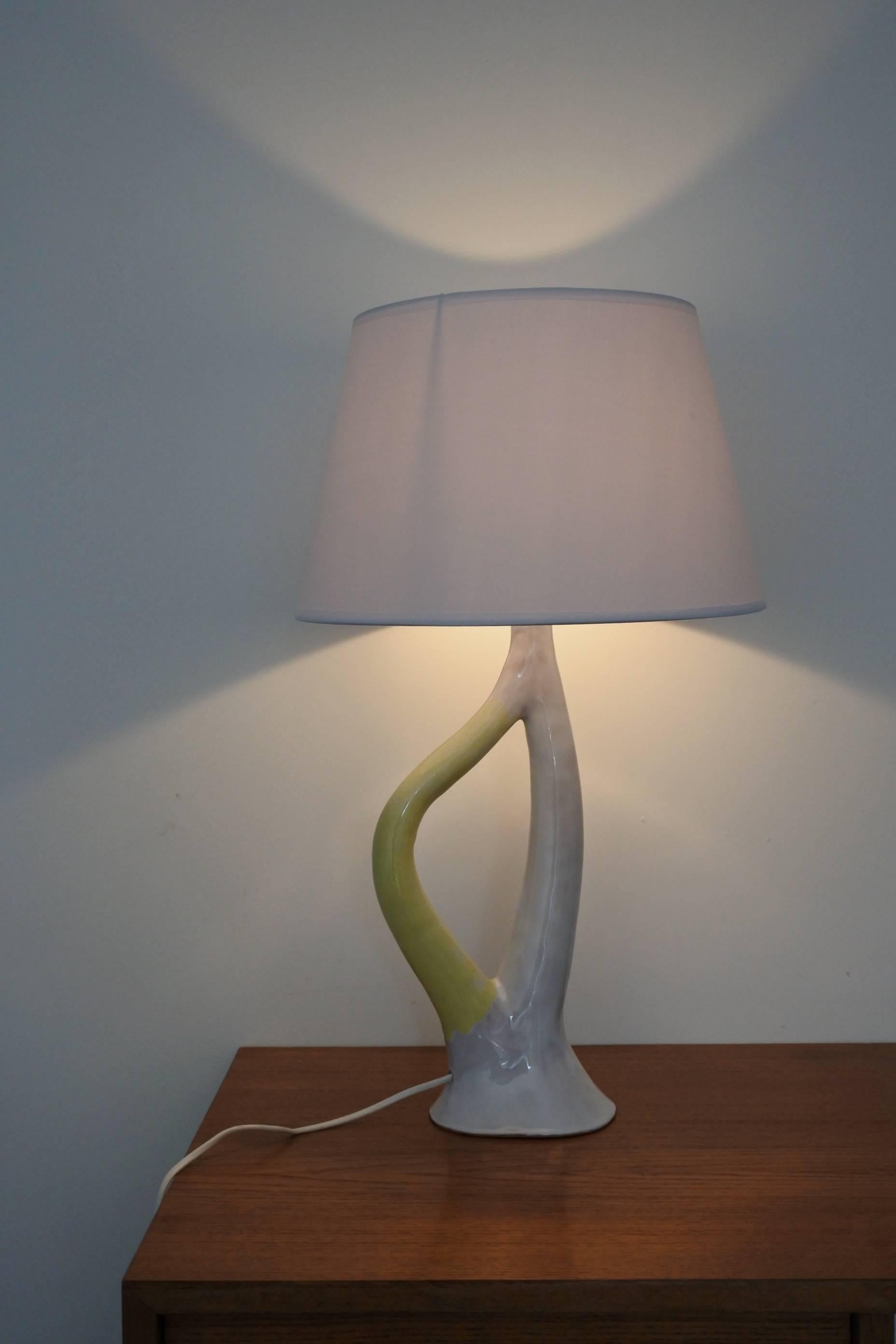 Mid-Century ceramic table lamp by French designer Jean Austruy.
Made in his pottery workshop in Vallauris circa 1950.
Excellent condition.
Measurements without shade: W 20 cm, H 43 cm
Jean Austruy, along other artists such as Jean Derval and