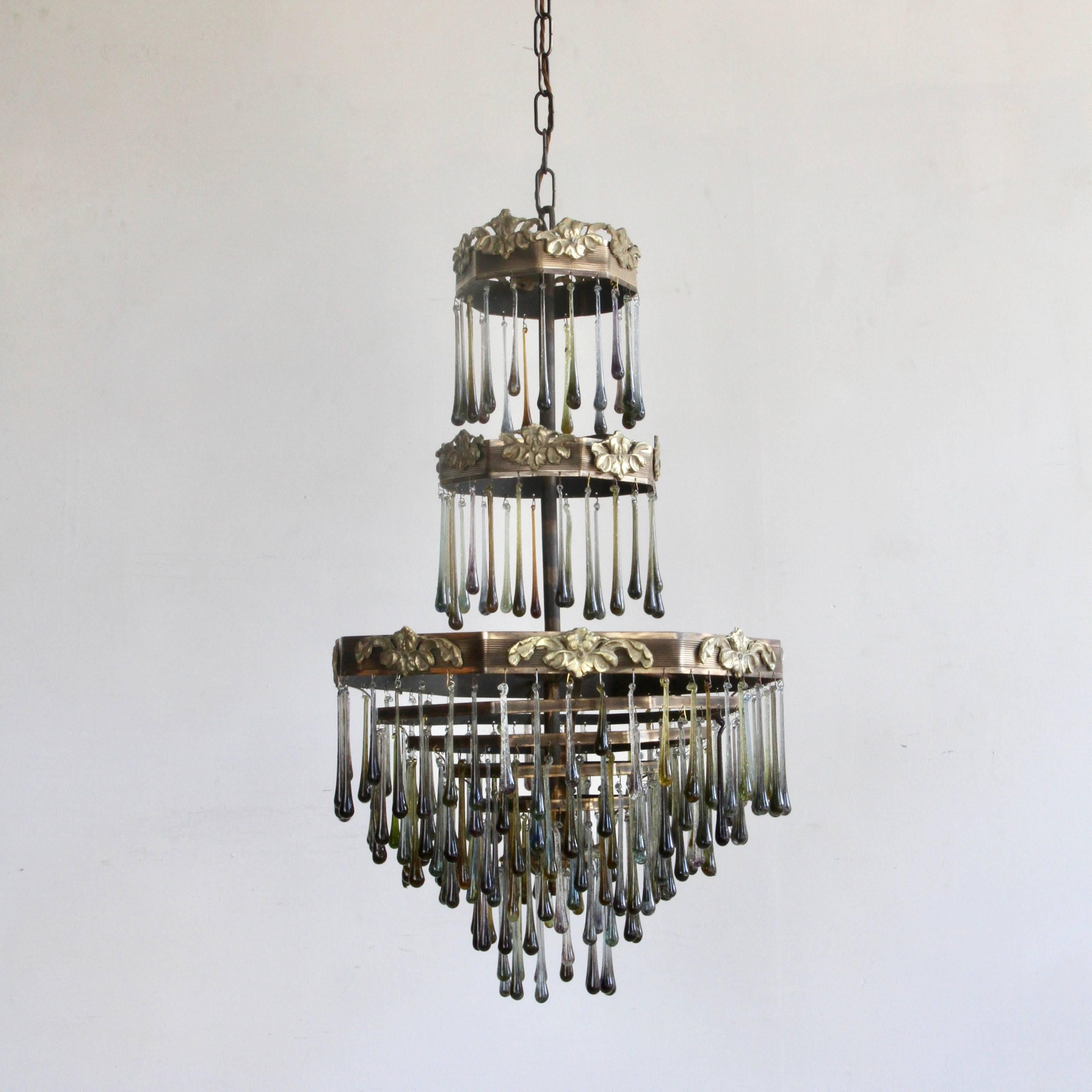 A 1920s French Waterfall chandelier frame dressed with handmade contemporary smokey glass teardrops. Chandelier uses four SBC fittings, B15. Supplied with chain and ceiling rose.