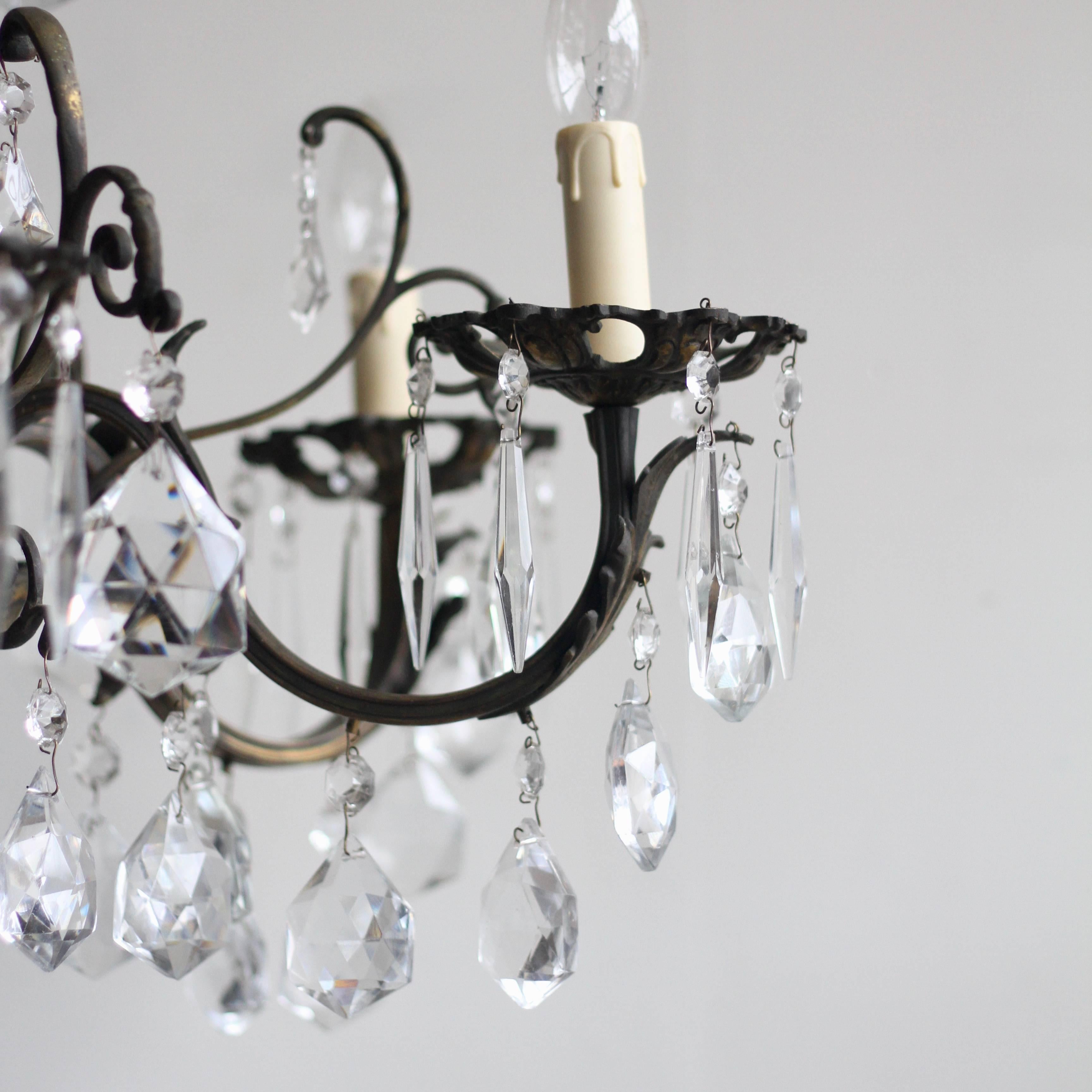 1920s French Heavy Cast Brass Chandelier Dressed in Crystal Drops In Good Condition In Stockport, GB
