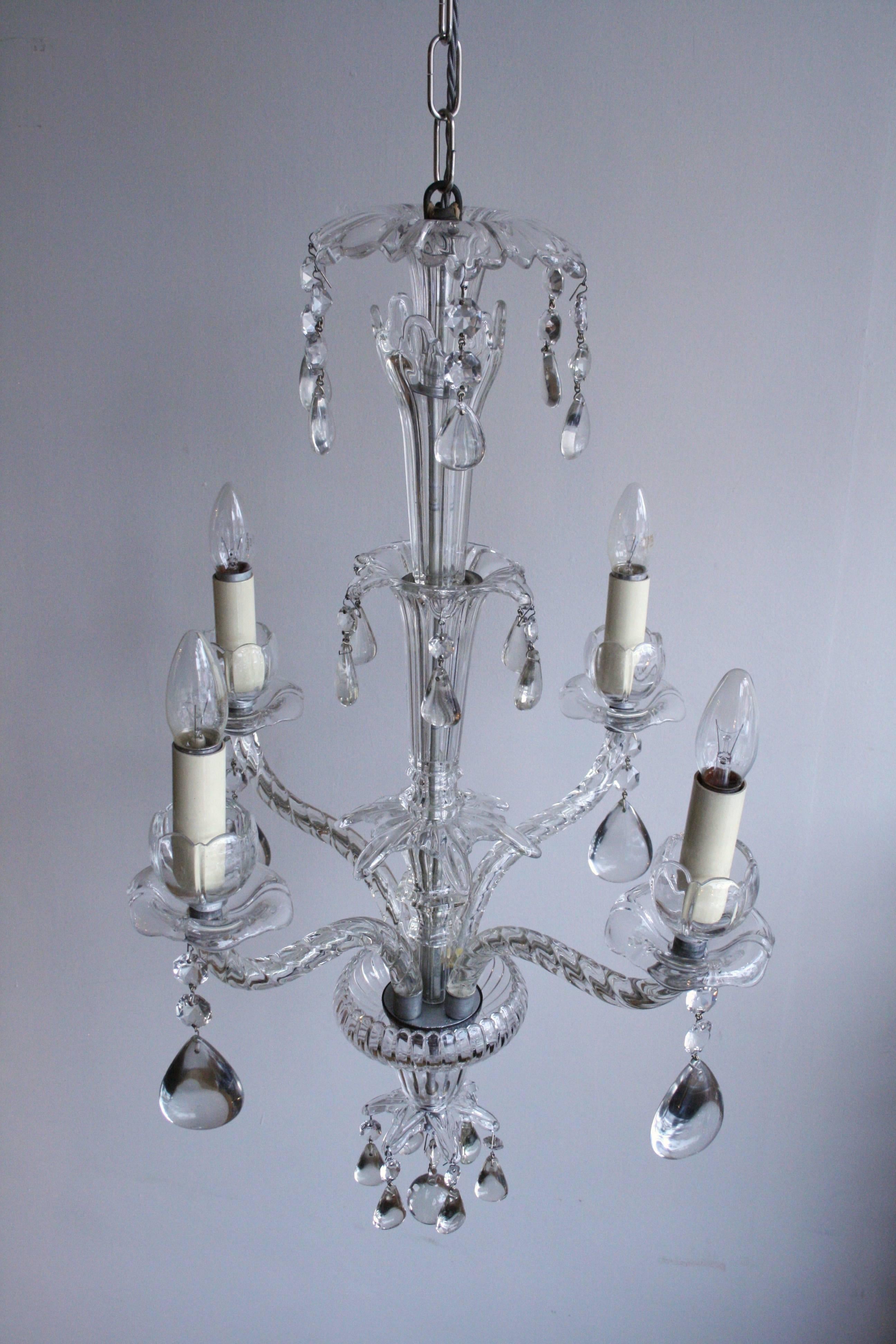 Early 20th century moulded crystal chandelier with rounded crystal pear drops.
Chandelier uses four SES fittings, E14. Supplied with chain and ceiling rose.