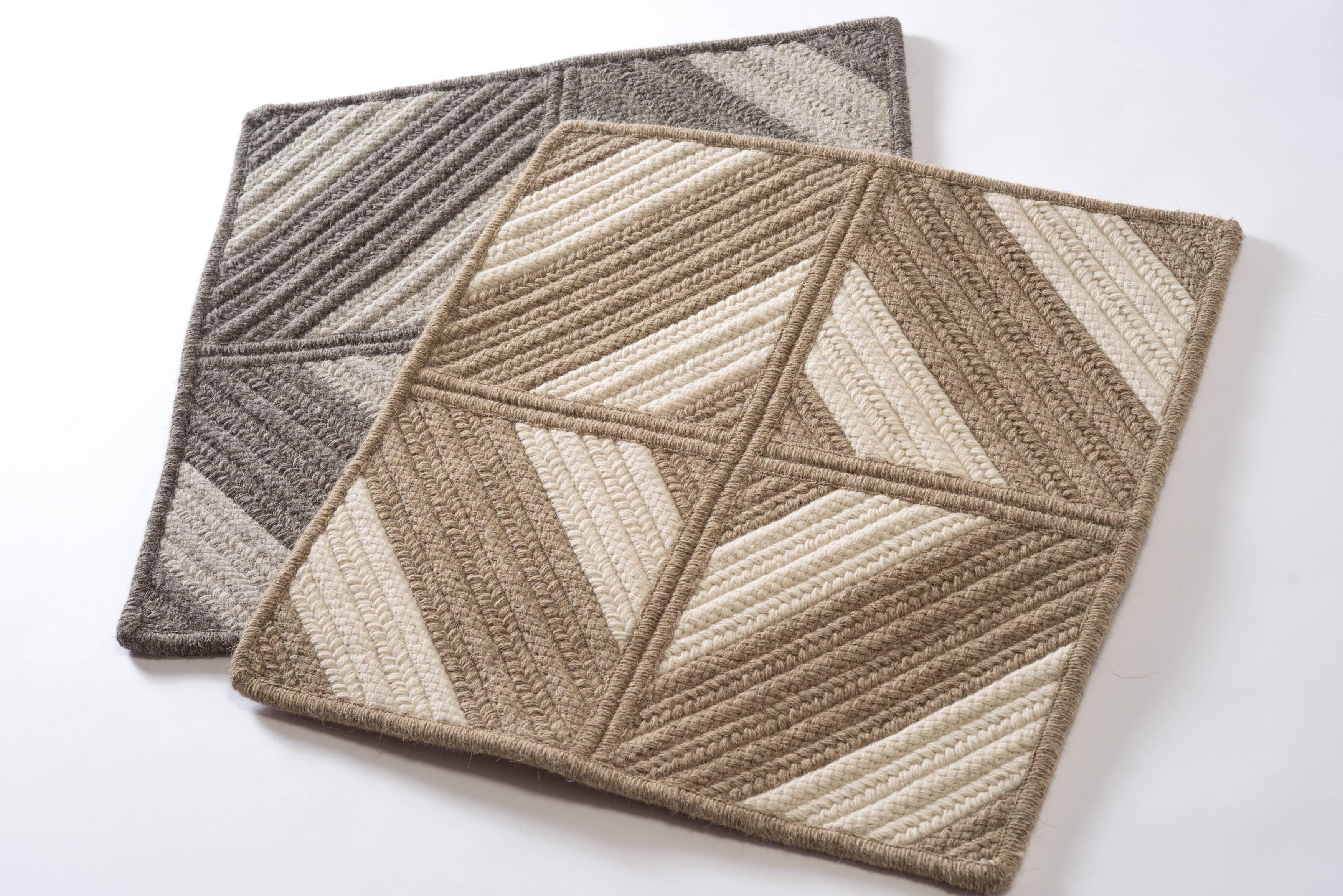 Araz rug natural and cream natural un-dyed wool 8 x 10 rectangle reversible designed and crafted in the USA.
Geometric forms combine in textural flat and cable woven braid of natural and cream yarns in natural un-dyed wool.
(image showing