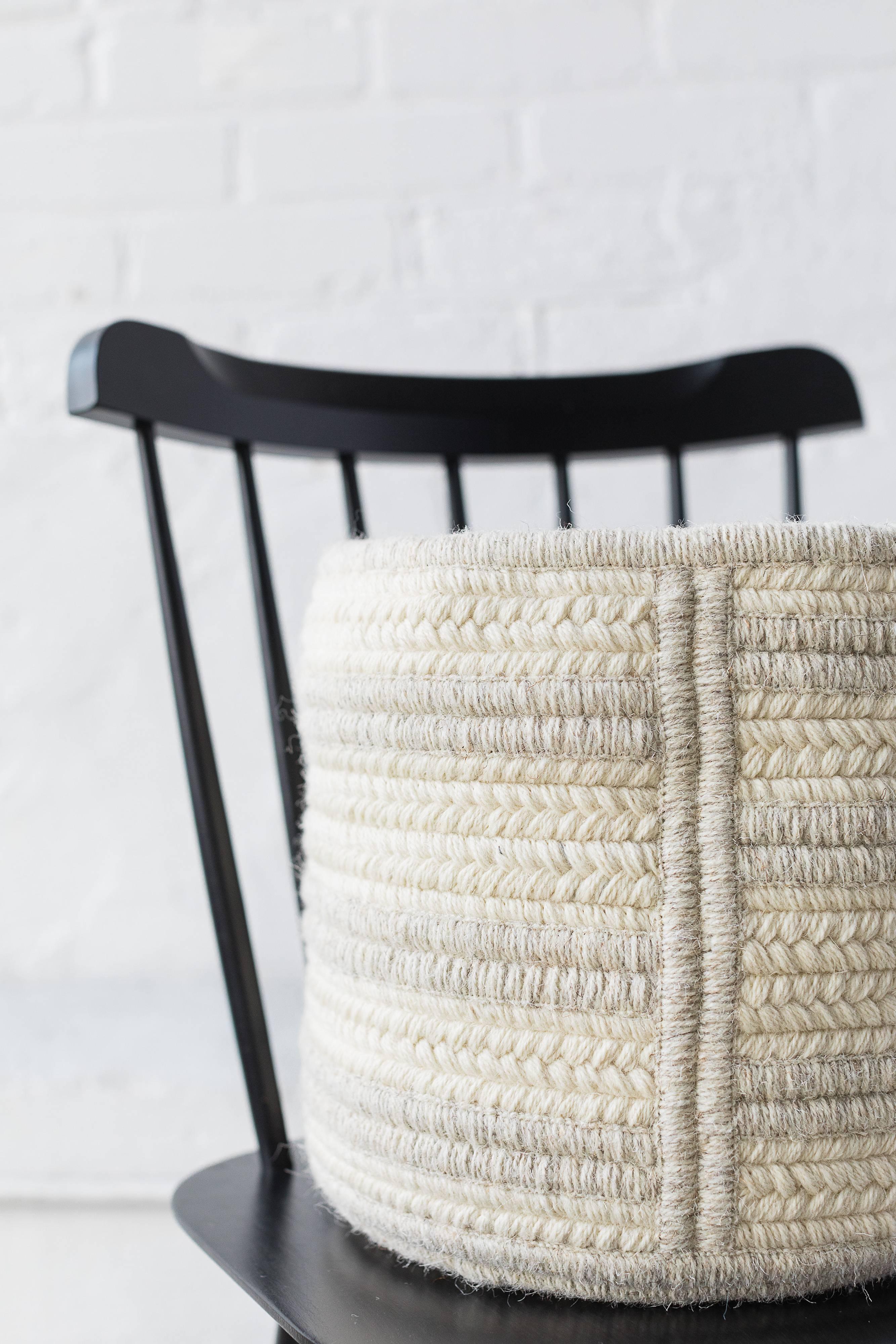 Our Raised Line Basket in Light Grey natural un-dyed woven wool is designed in our Boston studio, and custom made to order in Rhode Island, USA. This basket is soft, yet sturdy and can be used to hold shoes, books, throws or laundry. This listing is
