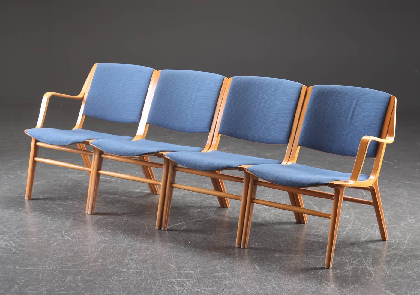 This lounge set was designed by Peter Hvidt & Orla Mølgaard-Nielsen for Fritz Hansen and is part of the AX series. It is made from beech and teak wood. The chairs are upholstered with a blue fabric. Measurements for the chairs: H 76cm x W 71cm x D