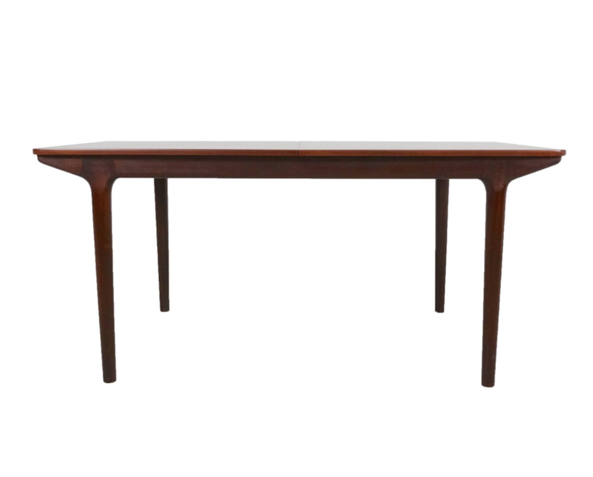 This table was designed by Tom Robertson for A.H. McIntosh of Kirkcaldy in Scotland and was in production during the 1960s and 1970s. The design features a firm and intelligent construction with two extension leaves that when extended, can seat up