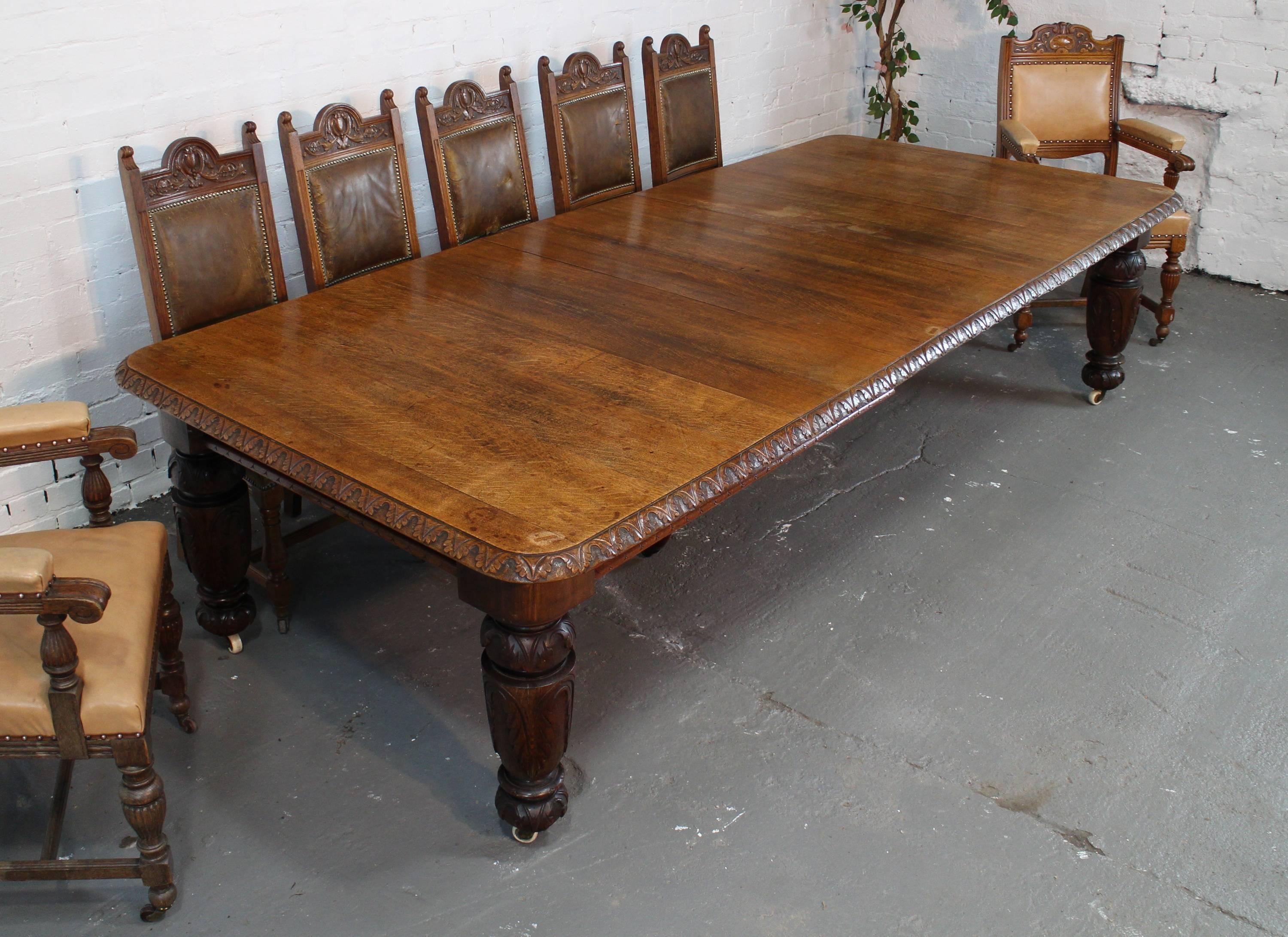 A good Victorian carved oak extending dining table featuring an acanthus leaf carved edge and legs. This 4ft 4½in wide table smoothly extends from 5ft to 9ft 9in allowing it to incorporate any combination of the three original leaves and seat up to