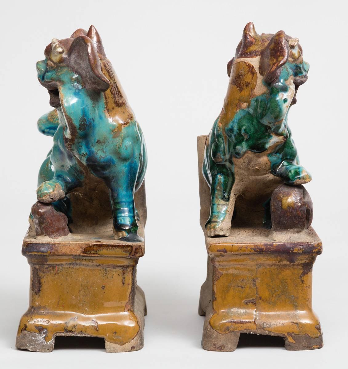 19th Century Pair of Chinese Pottery Glazed Foo Dog Incense Holders