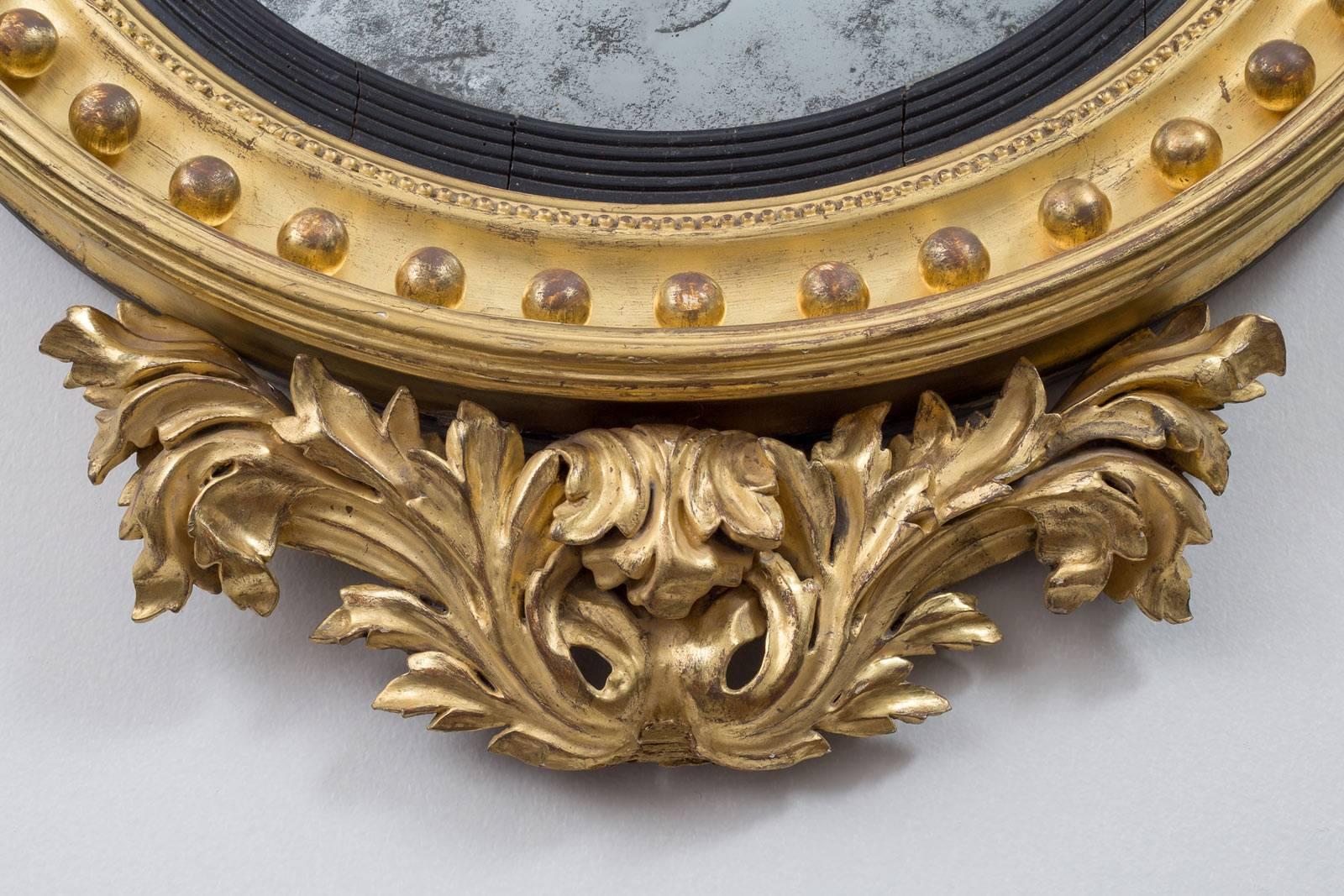 English Regency Giltwood Convex Mirror with Eagle For Sale