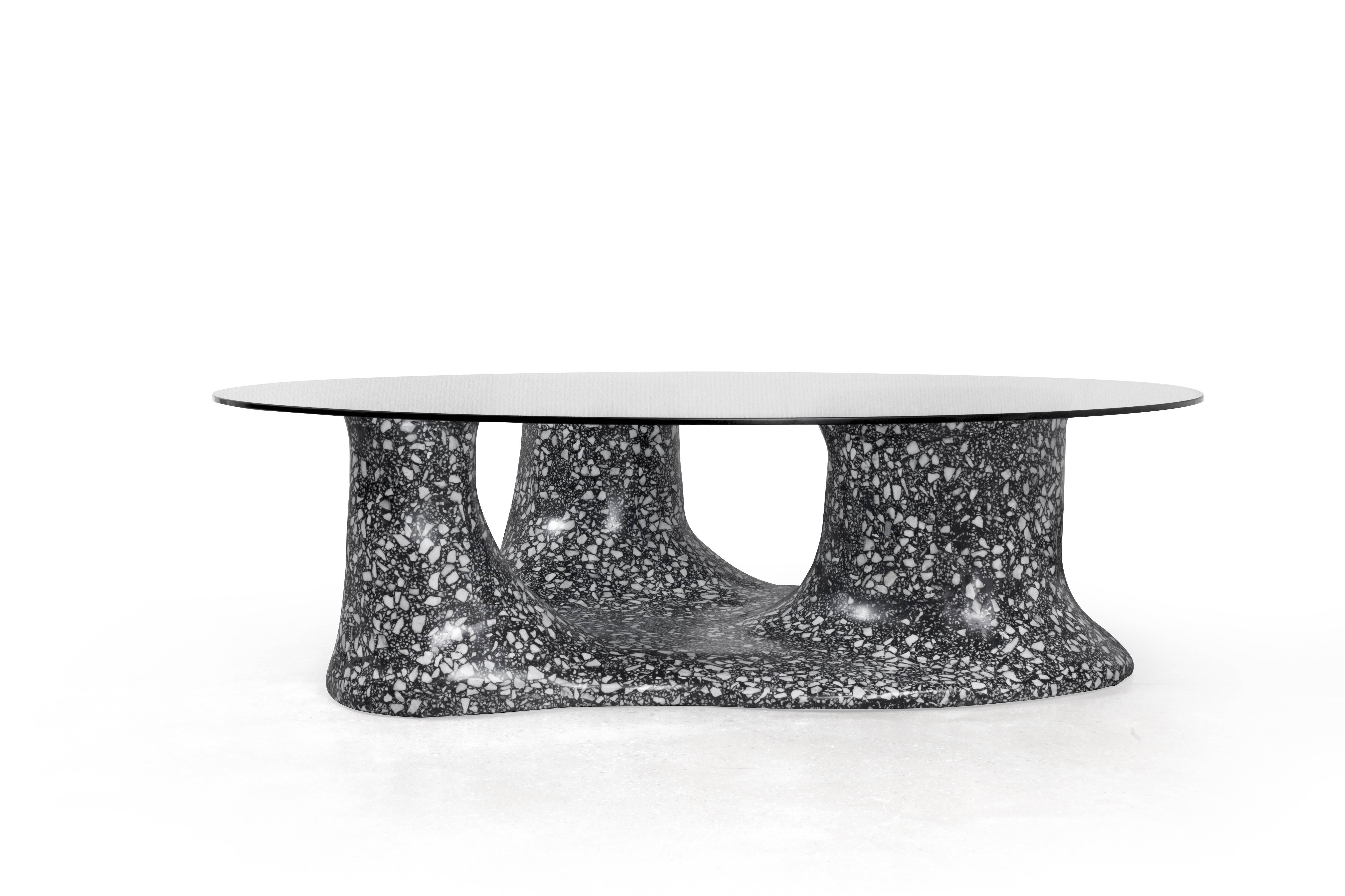 Glass table top resting on surrealist cement and marble terrazzo moonscape terrain base.

Hand-shaped, so each piece is one of a kind.

Custom sizes and Color available.