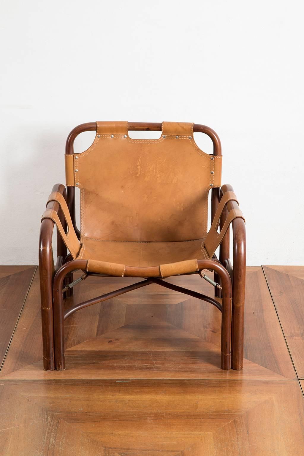 Bamboo and patinated cognac leather armchair produced by Bonacina in the 1960s.

Bonacina
In 1889 Giovanni Bonacina founded his small business in the wake of the ancient art of Lombard basket makers. He was full of confidence due to the experience