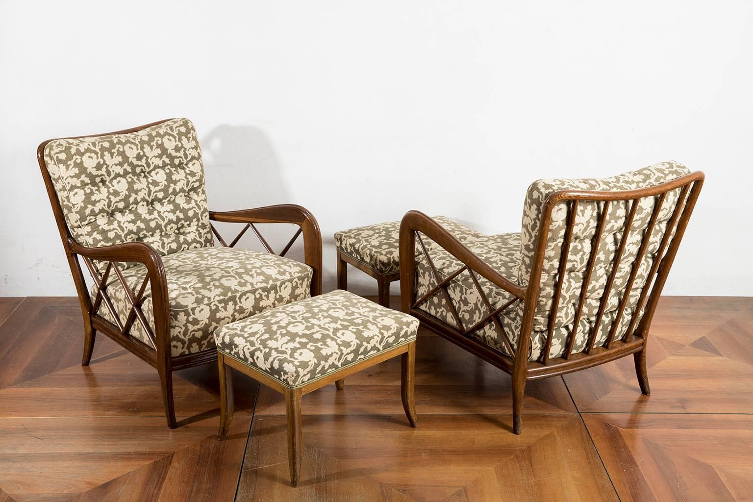 Iconic set of two mahogany solid wood armchairs with footrests designed by Paolo Buffa in the 1940s with their original fabric.