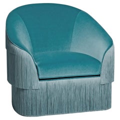 Sillón de flecos confeccionado a mano en terciopelo