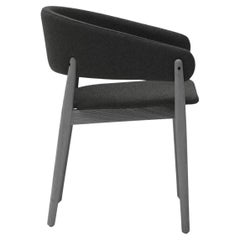 Contemporary Slope Dining Chair Featuring an Ergonomic Backrest